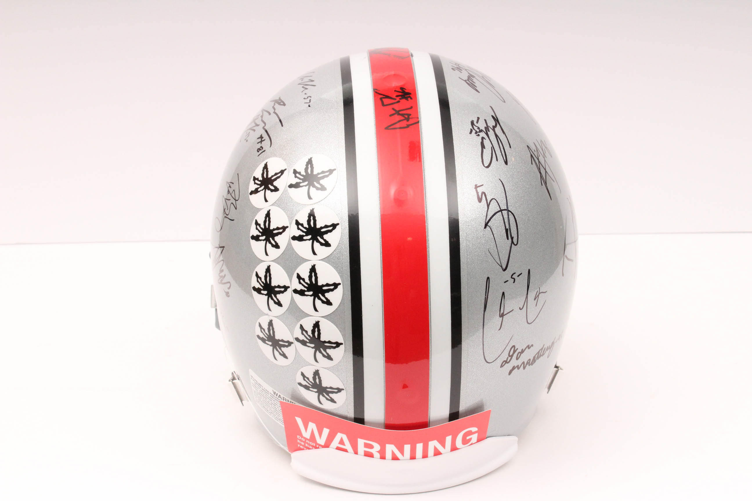 Jim Tressel and Players Autographed OSU Helmet