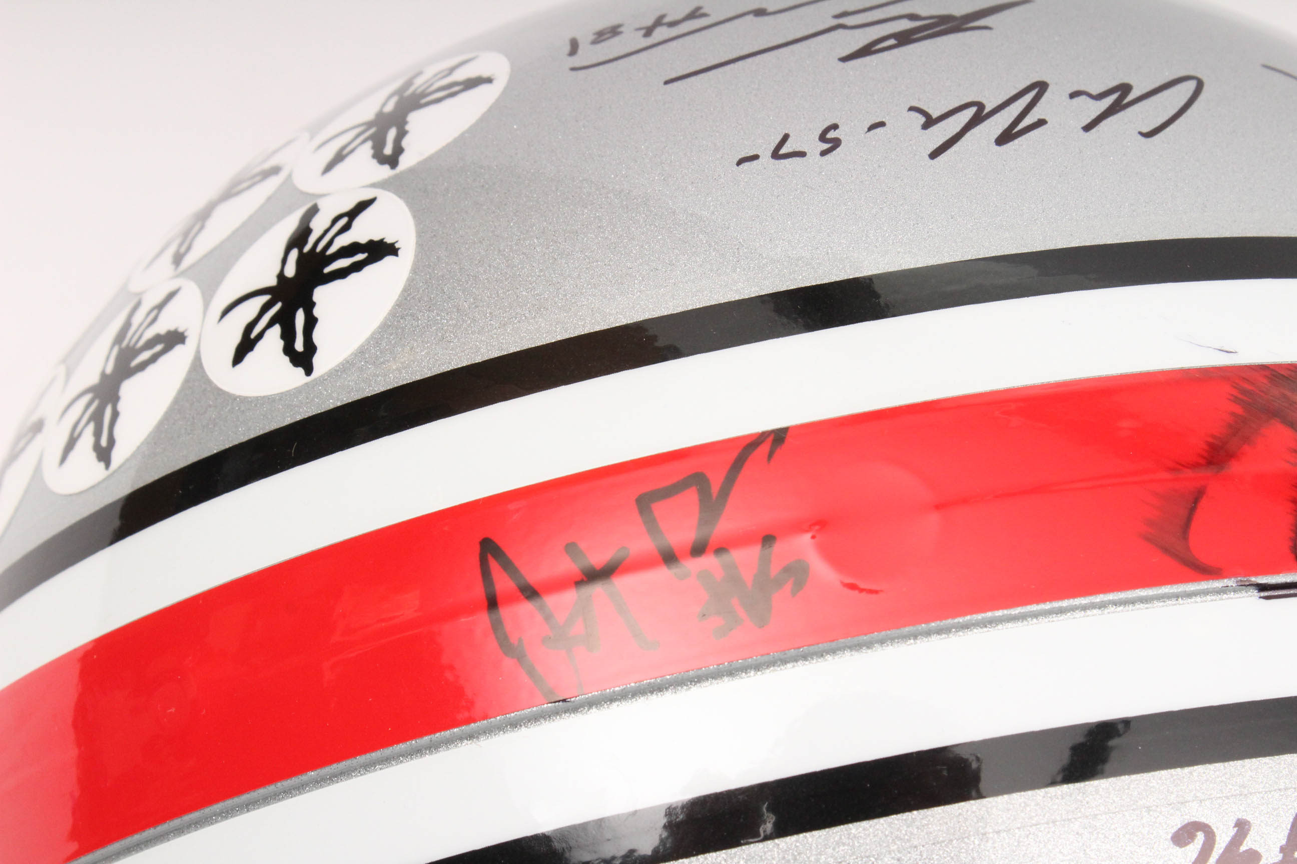 Jim Tressel and Players Autographed OSU Helmet