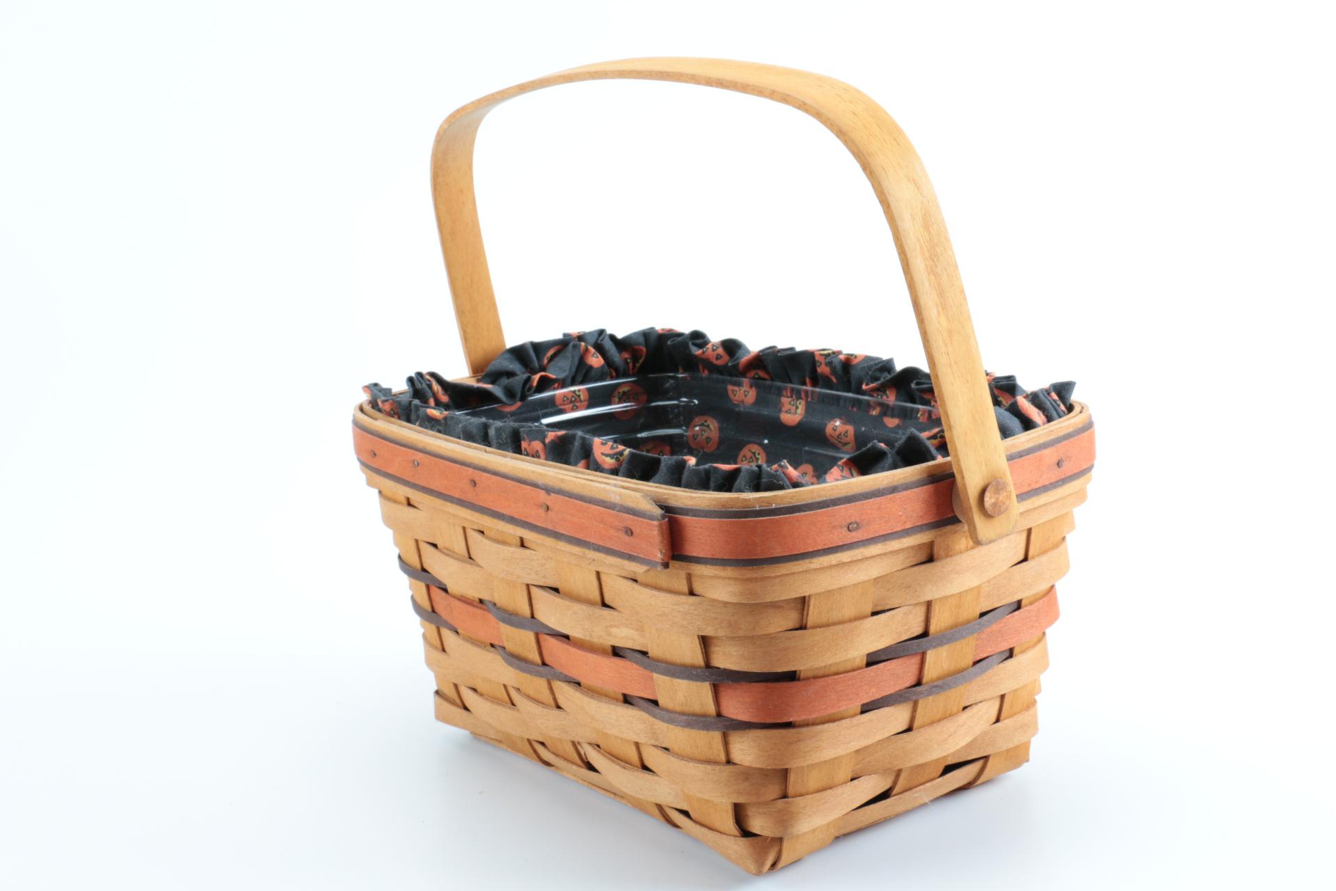 Large Group of Halloween Longaberger Baskets, Pottery, and Accessories