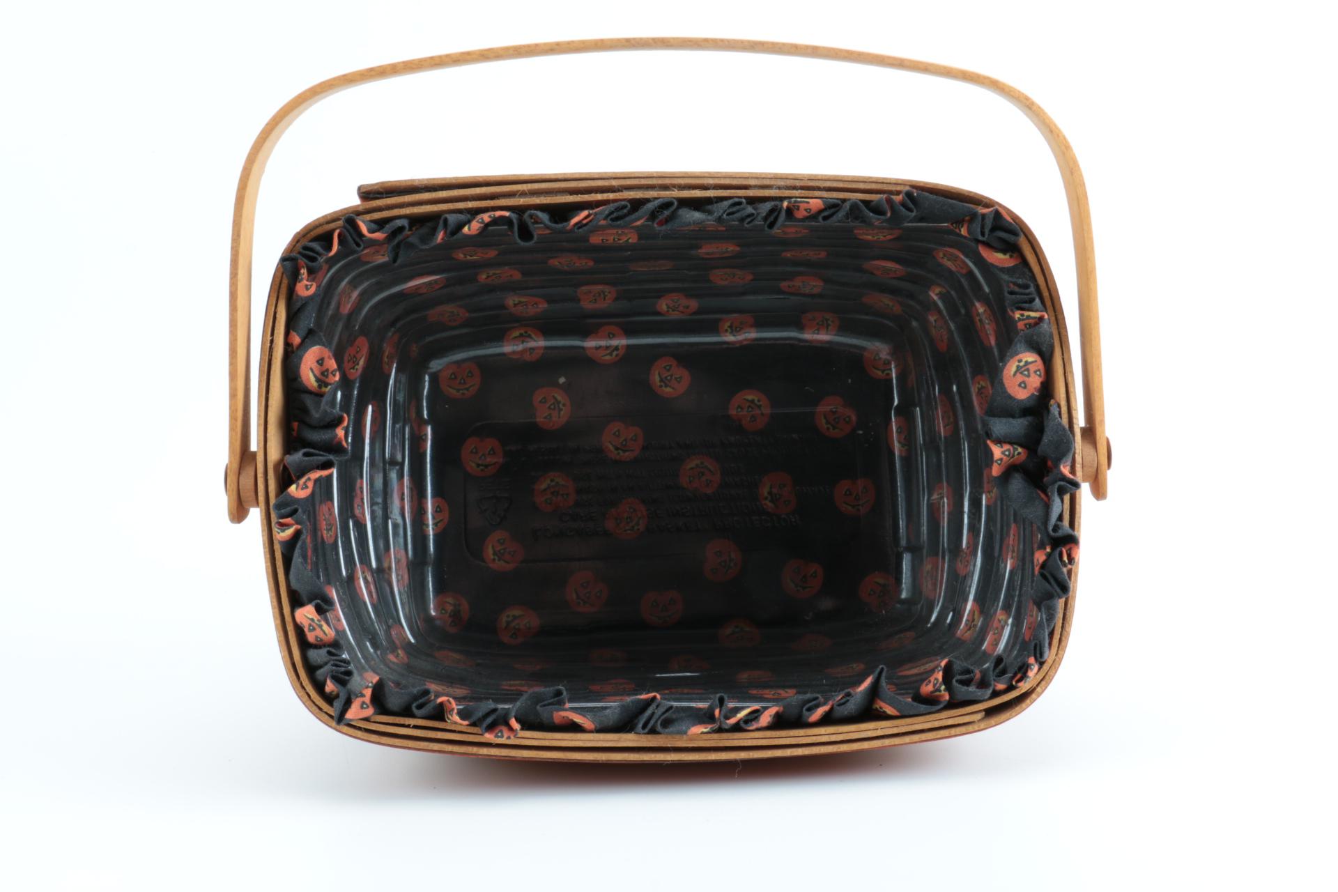 Large Group of Halloween Longaberger Baskets, Pottery, and Accessories