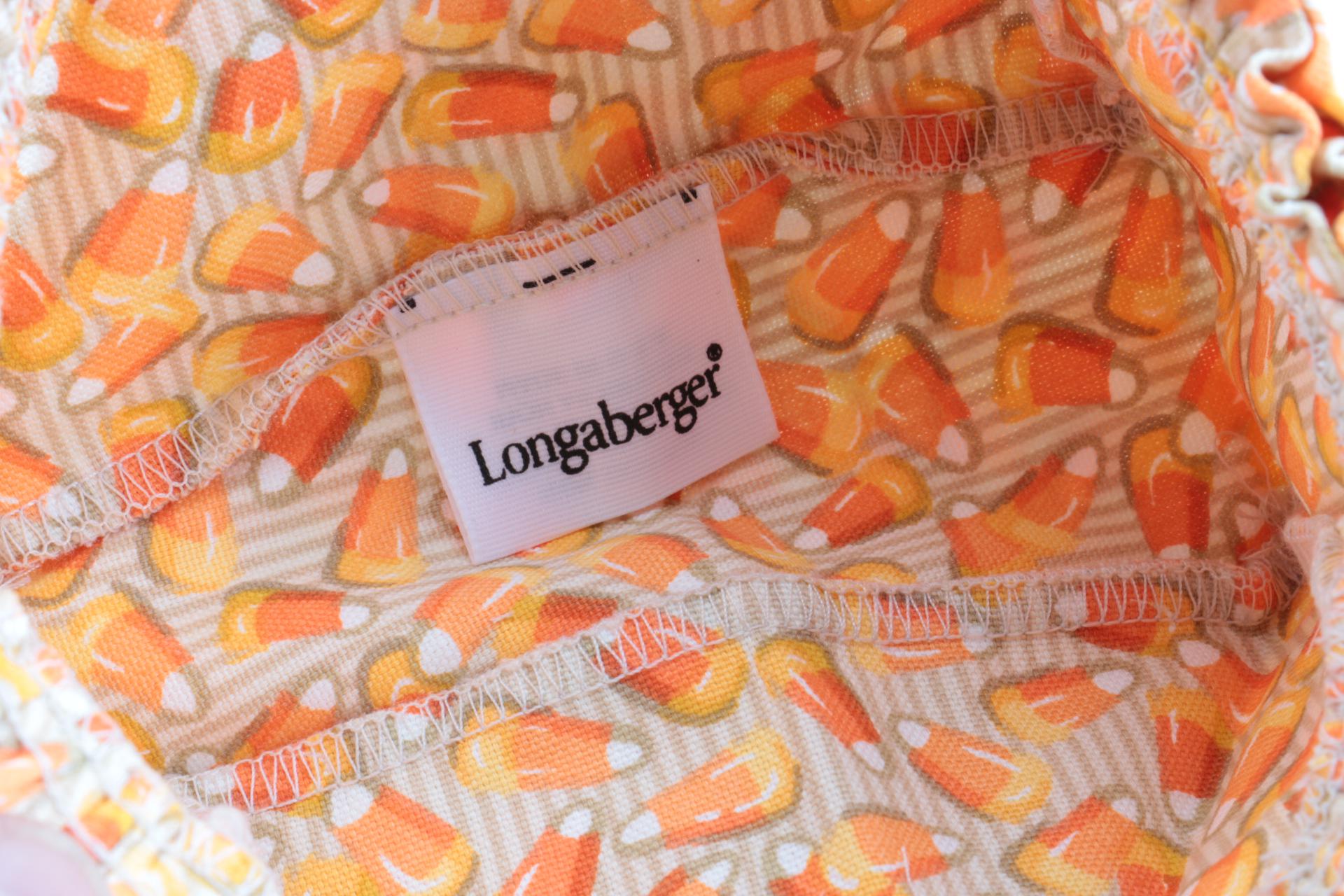 Large Group of Halloween Longaberger Baskets, Pottery, and Accessories