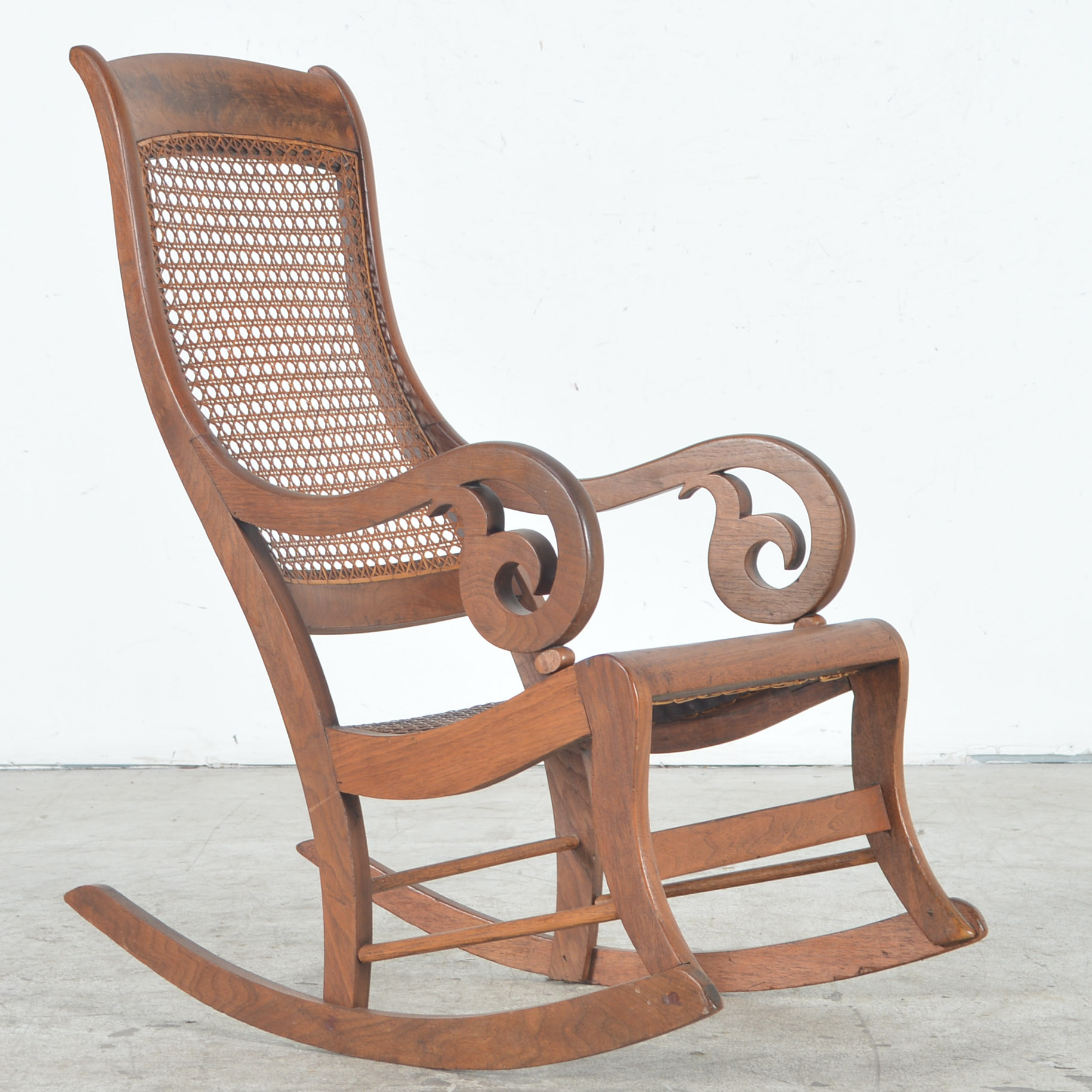 Antique Rocking Chair with Cane Seat and Back