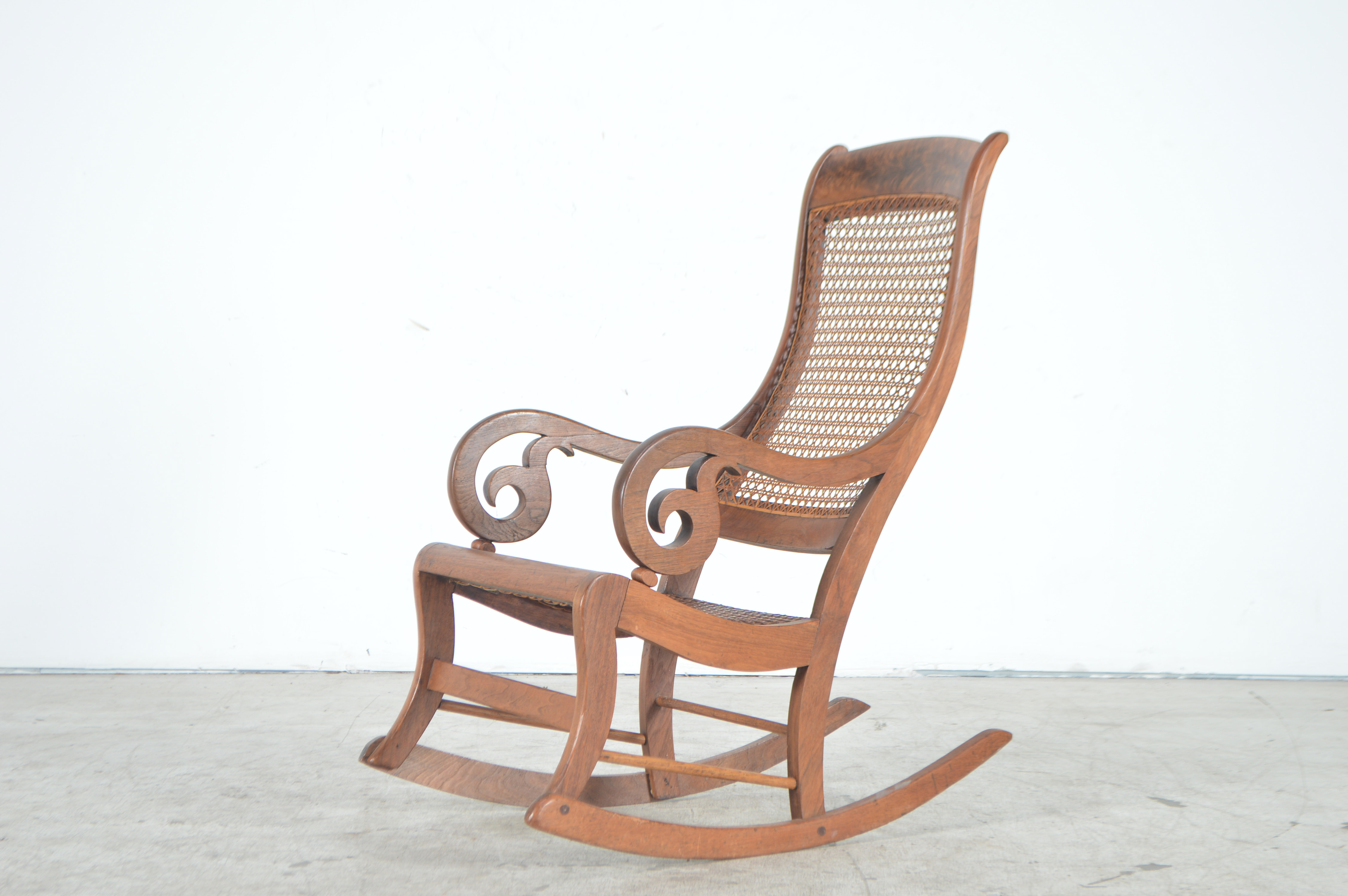Antique Rocking Chair with Cane Seat and Back