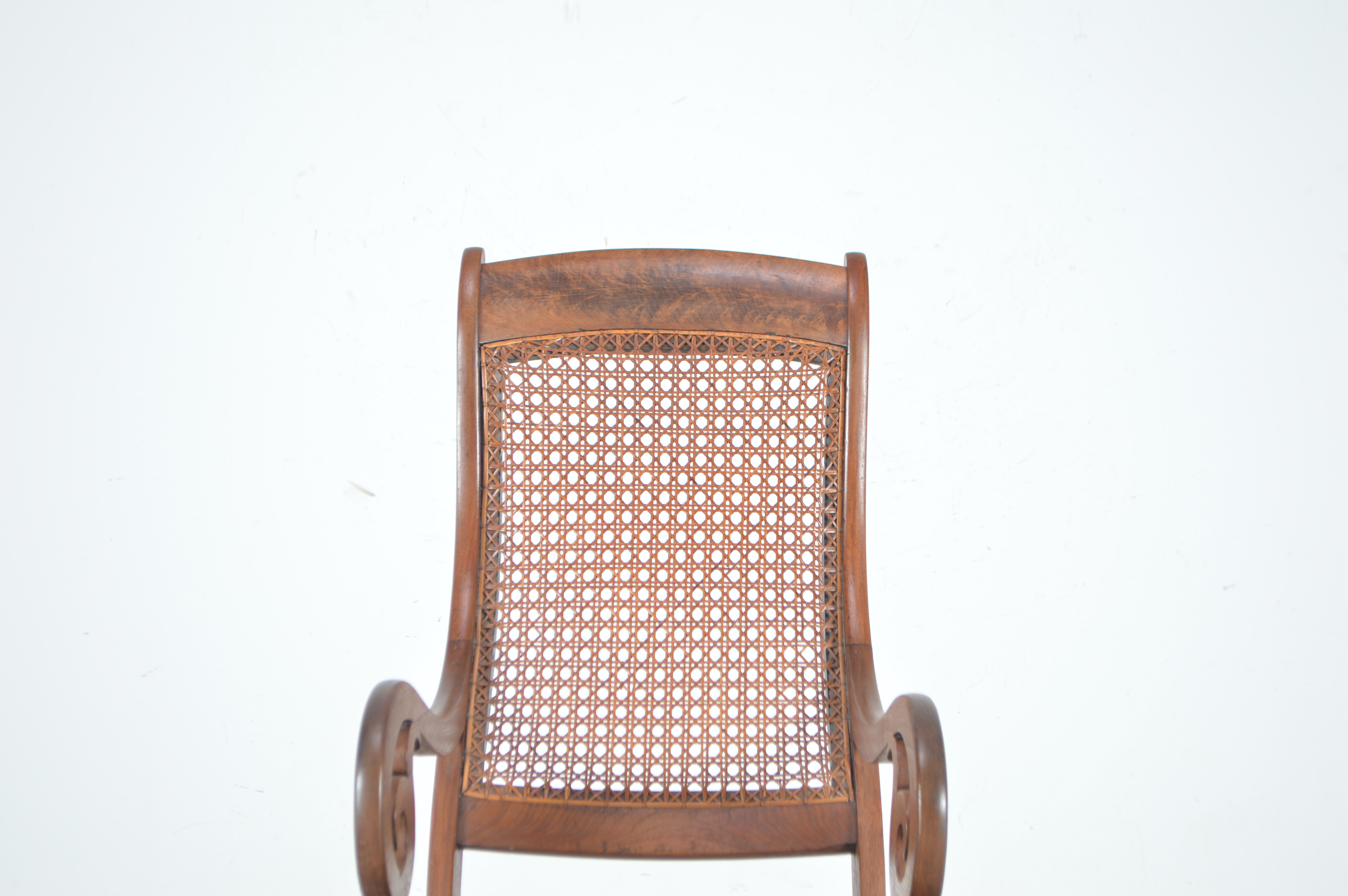 Antique Rocking Chair with Cane Seat and Back
