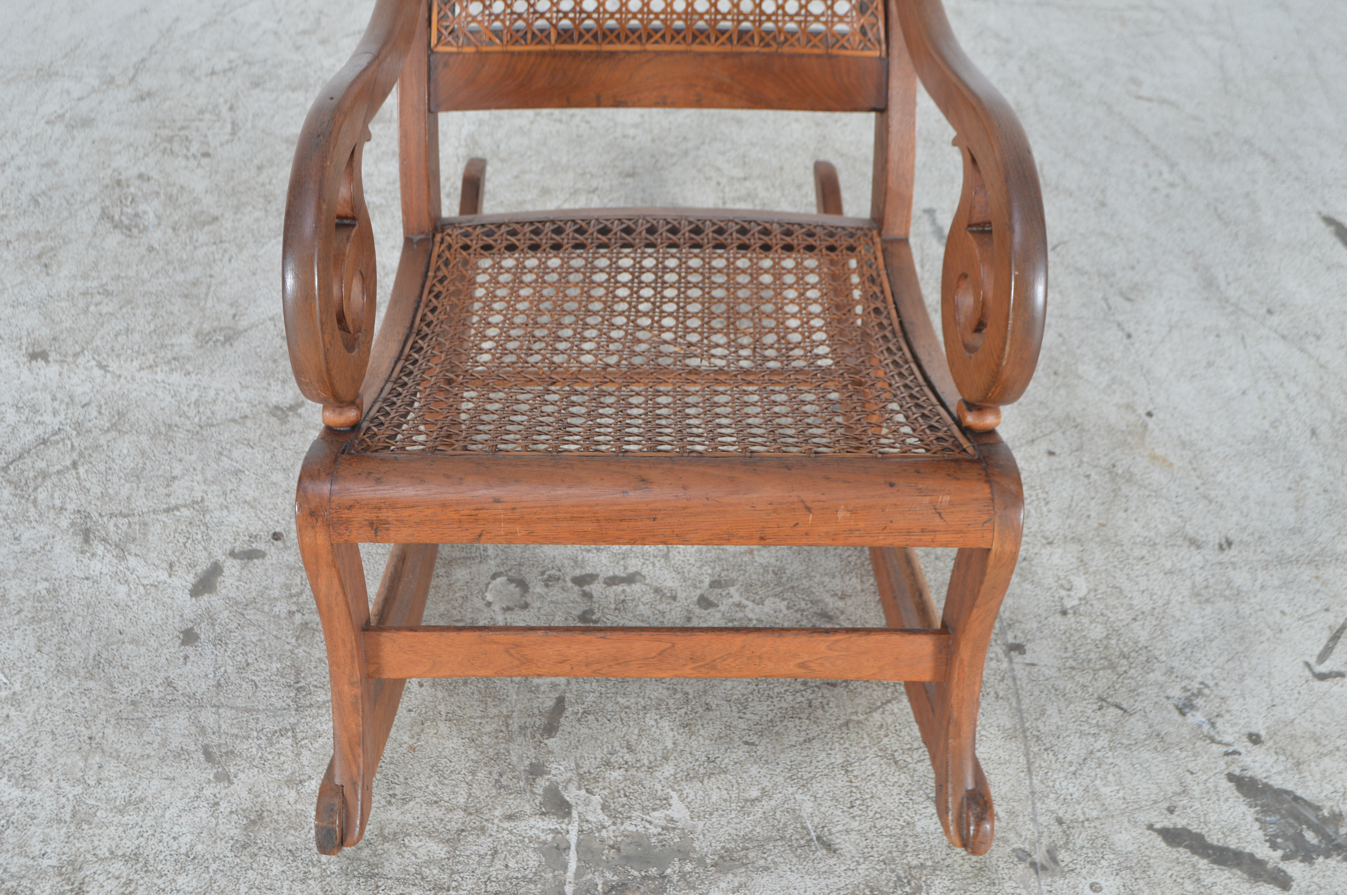 Antique Rocking Chair with Cane Seat and Back
