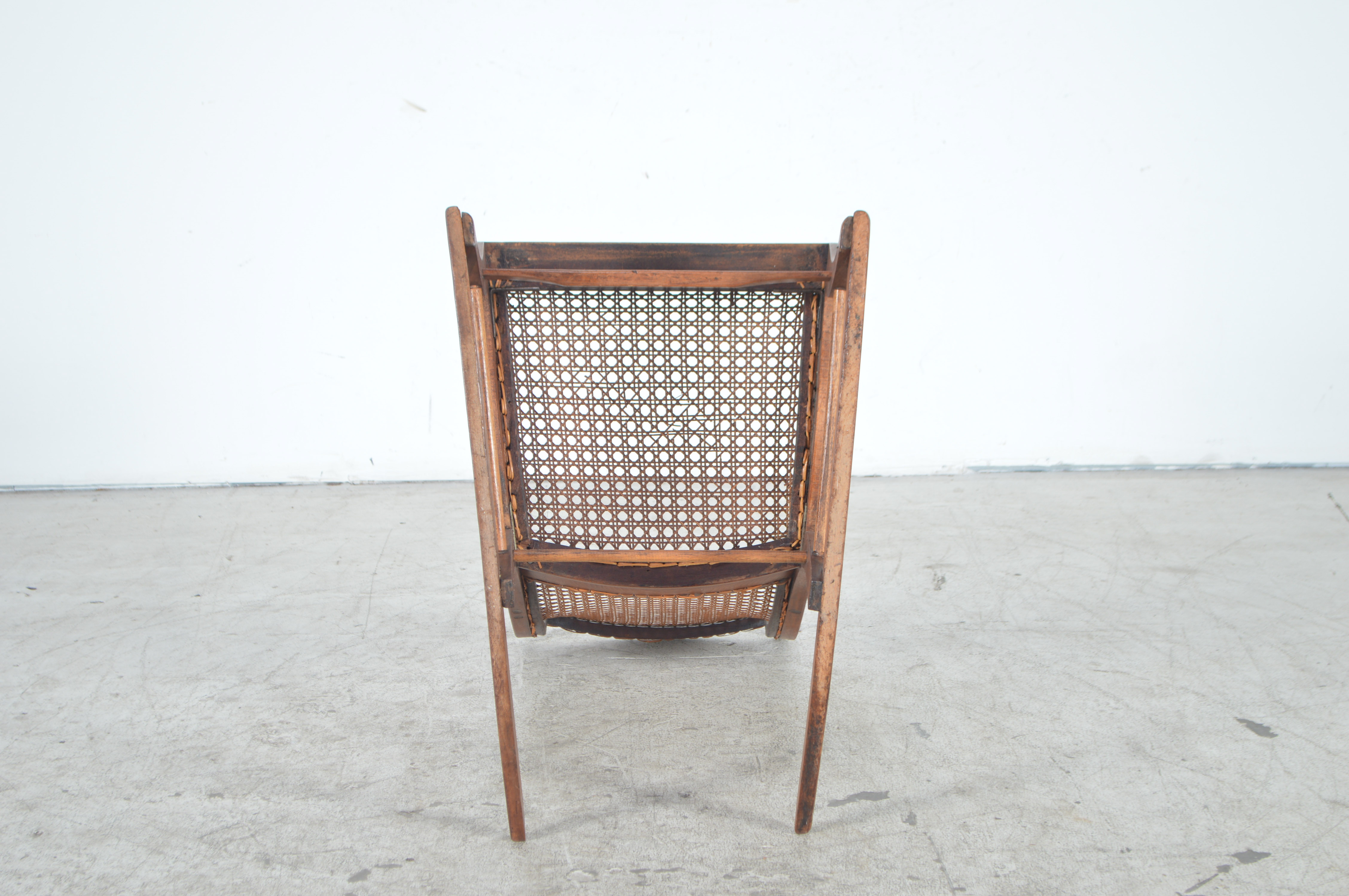 Antique Rocking Chair with Cane Seat and Back