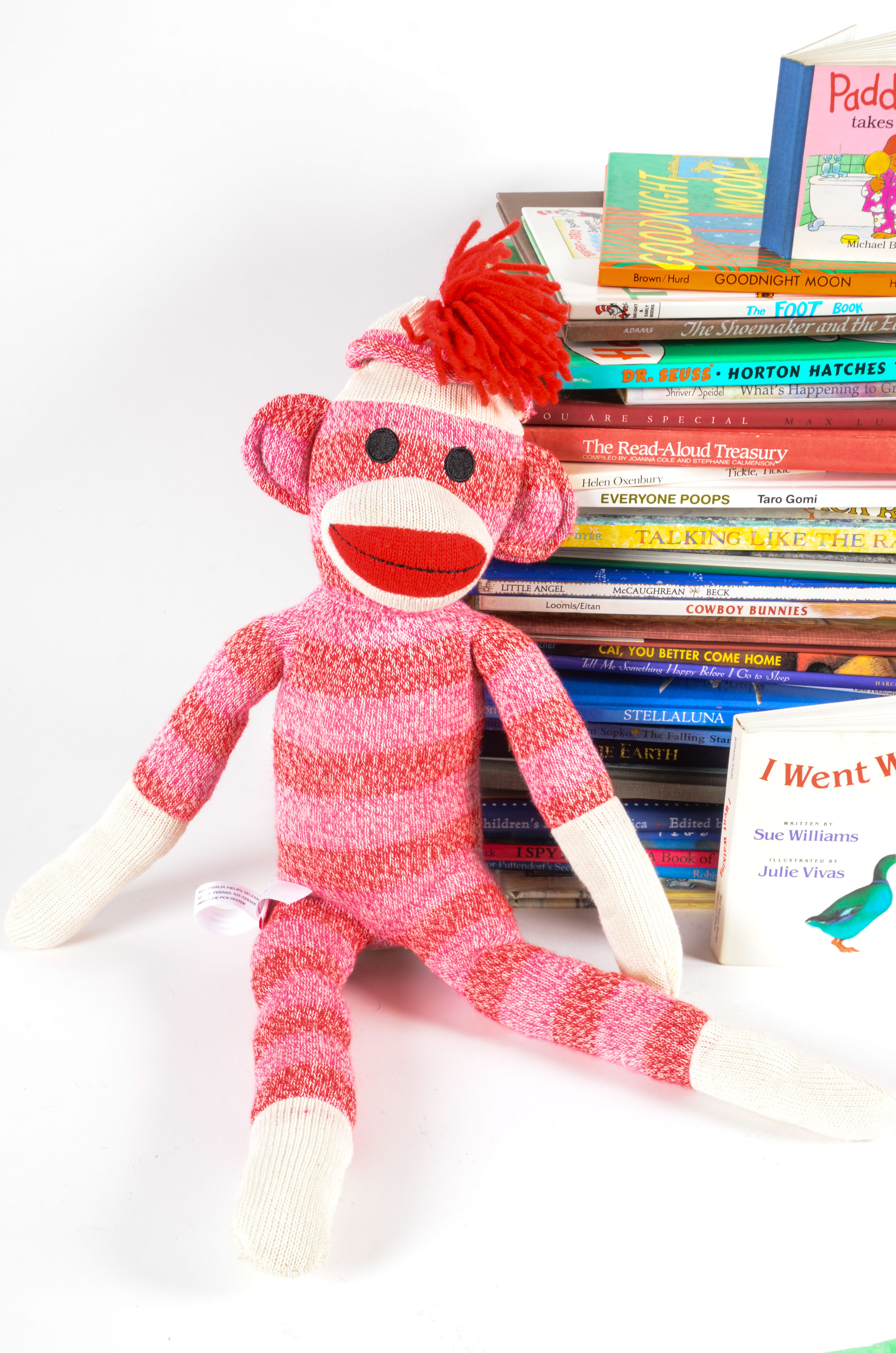Generous Collection of Chidren's Books and a Sock Monkey Toy