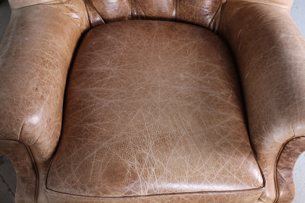 Tufted Brown Leather Armchair and Ottoman