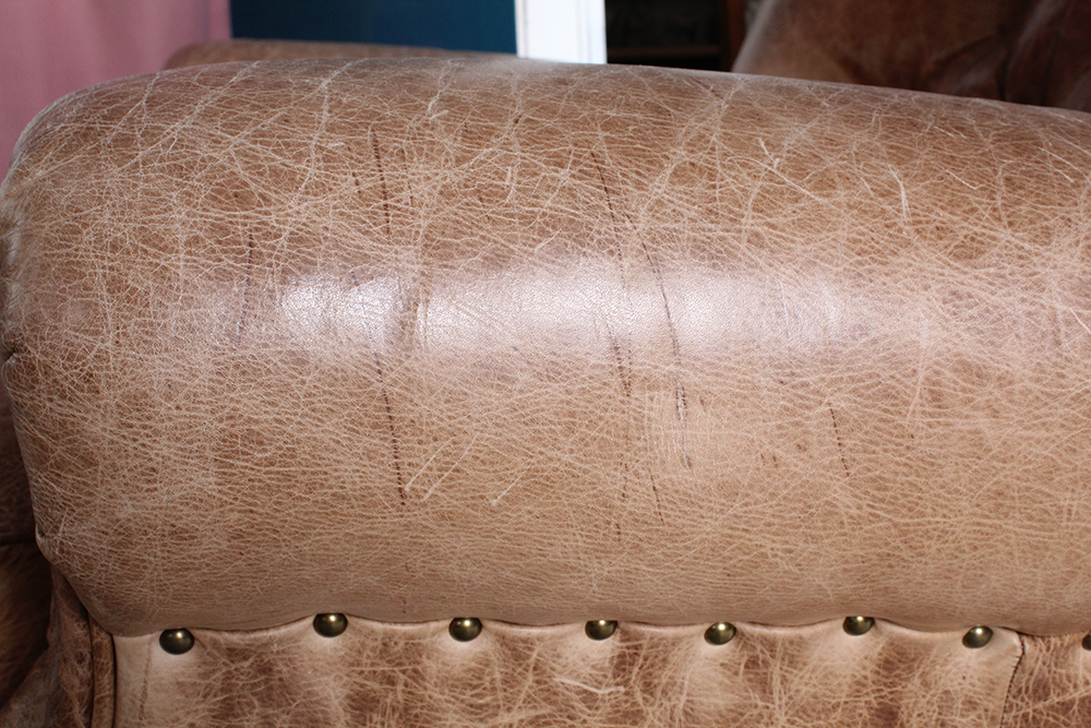 Tufted Brown Leather Armchair and Ottoman