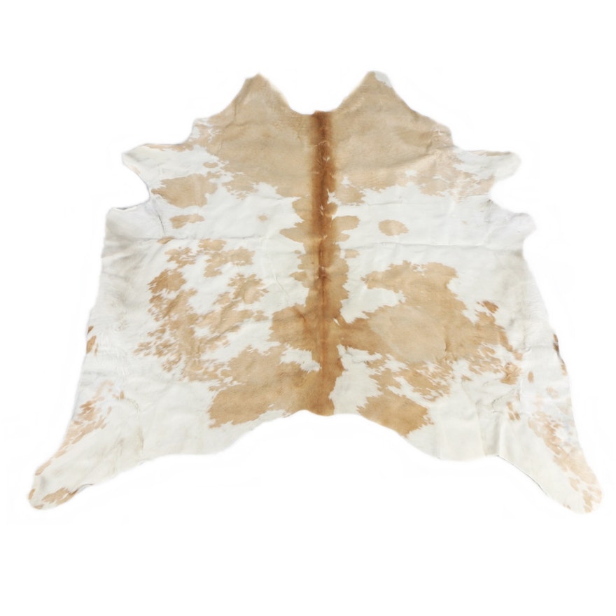 Creme and Caramel Natural Cow Hide Area Rug from Arhaus