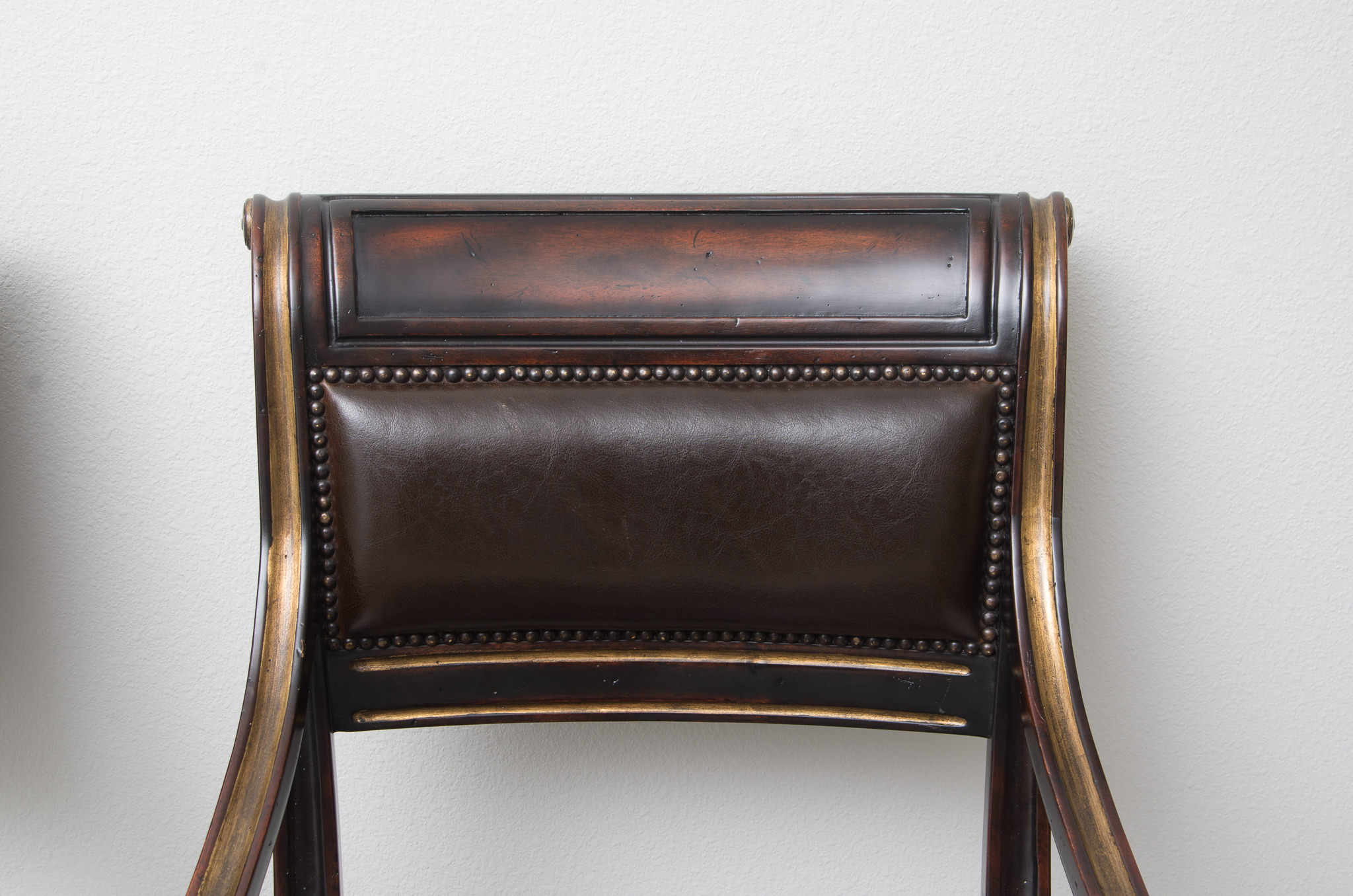 Pair of Louis XVI Style Leather Open Arm Chairs with Cane Seats