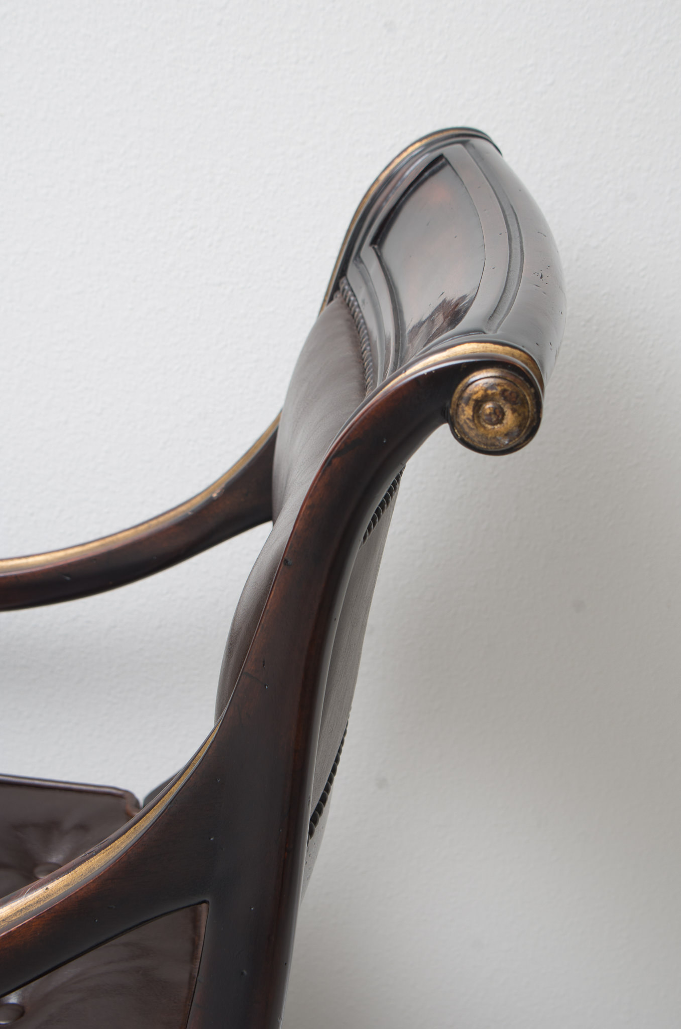 Pair of Louis XVI Style Leather Open Arm Chairs with Cane Seats