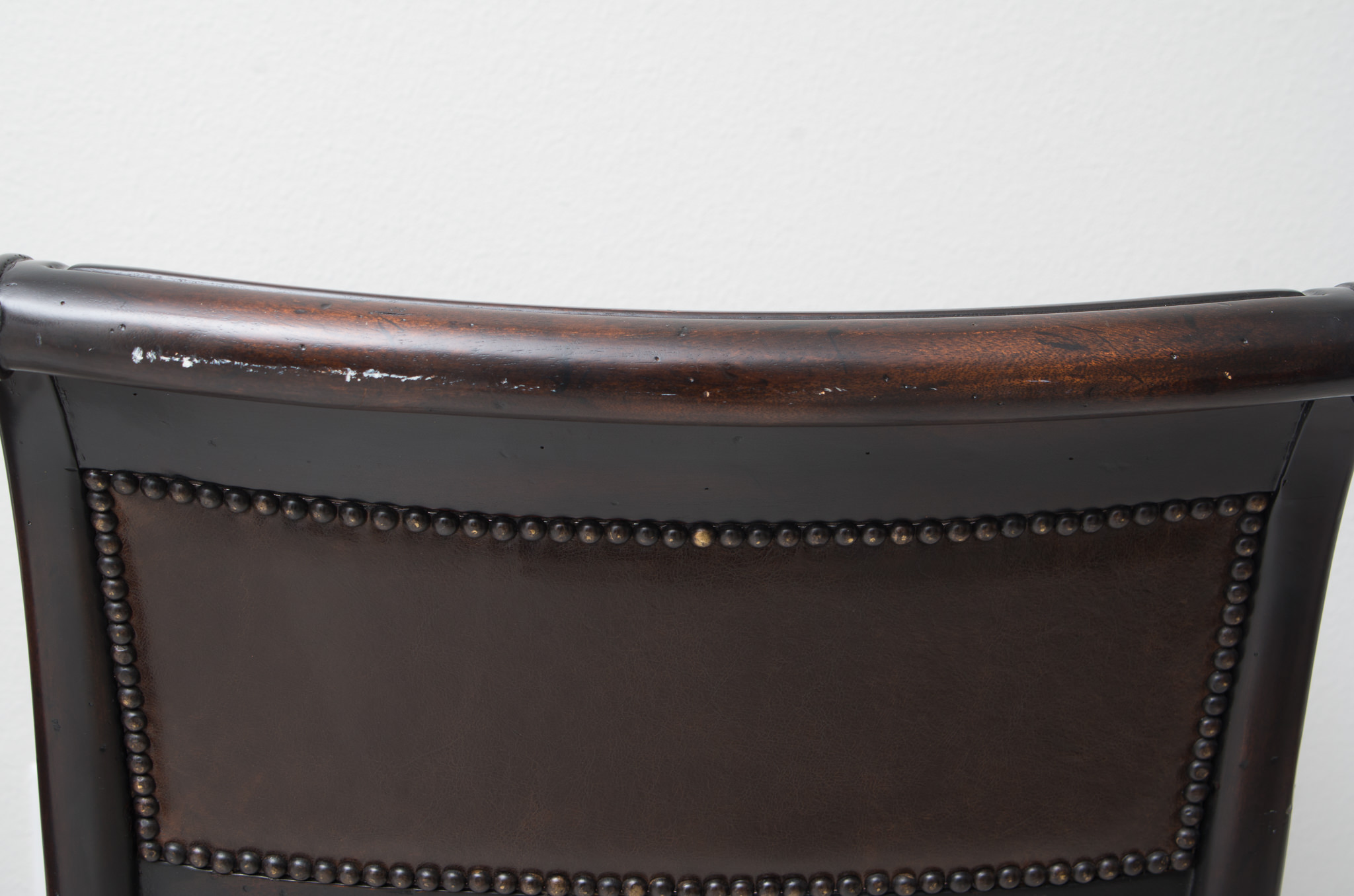 Pair of Louis XVI Style Leather Open Arm Chairs with Cane Seats