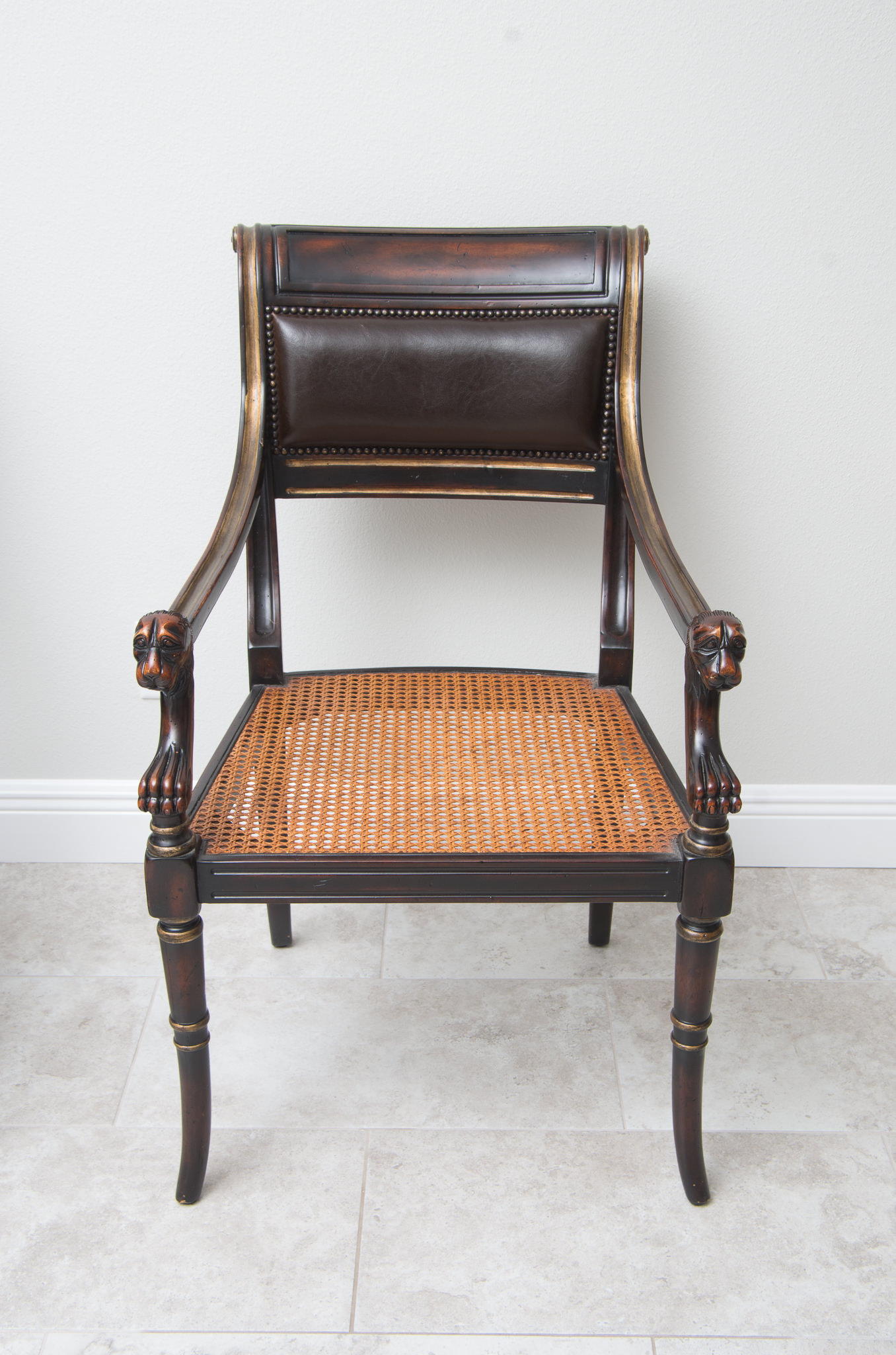 Pair of Louis XVI Style Leather Open Arm Chairs with Cane Seats