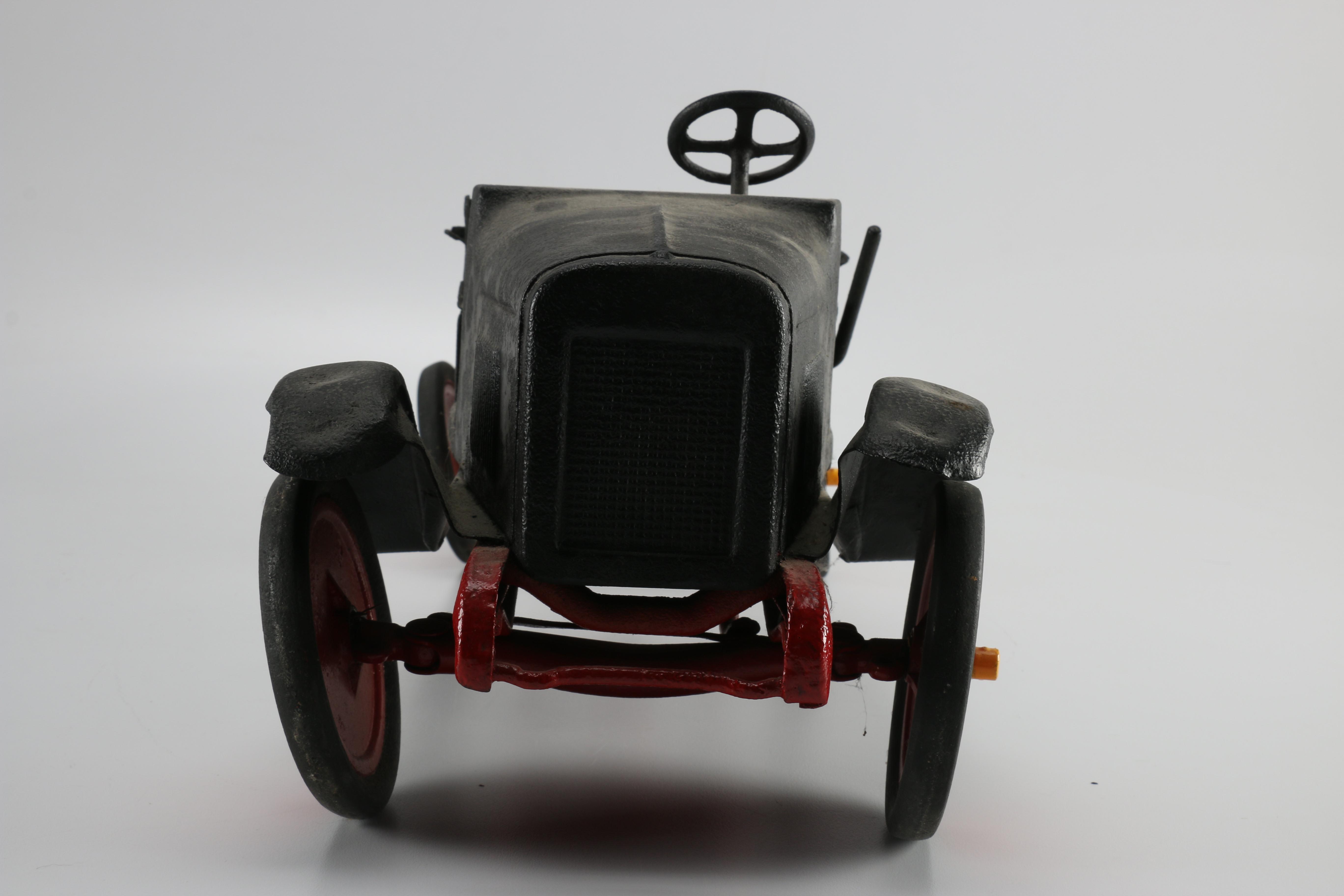 Black and Red Toy Truck