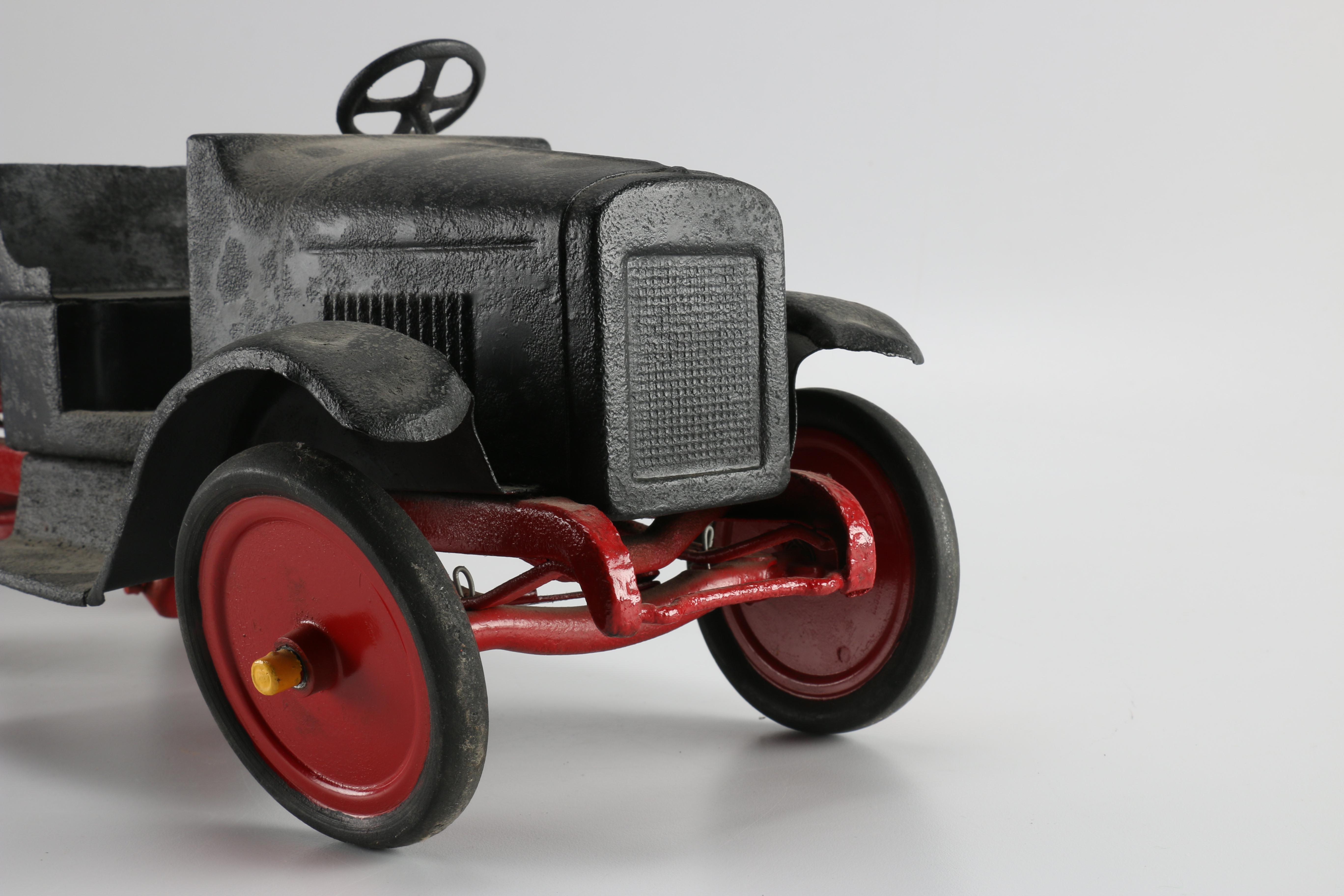 Black and Red Toy Truck