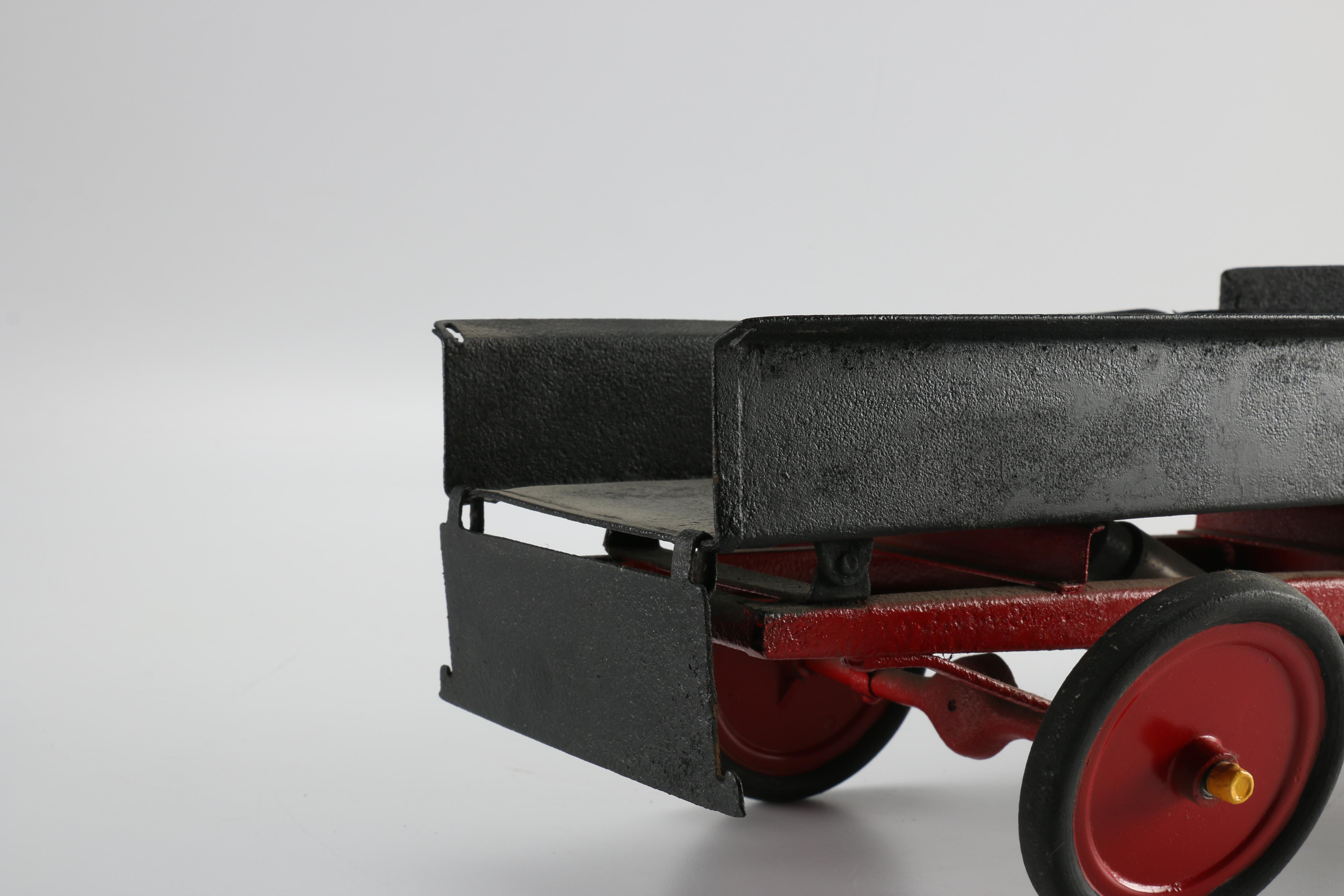 Black and Red Toy Truck