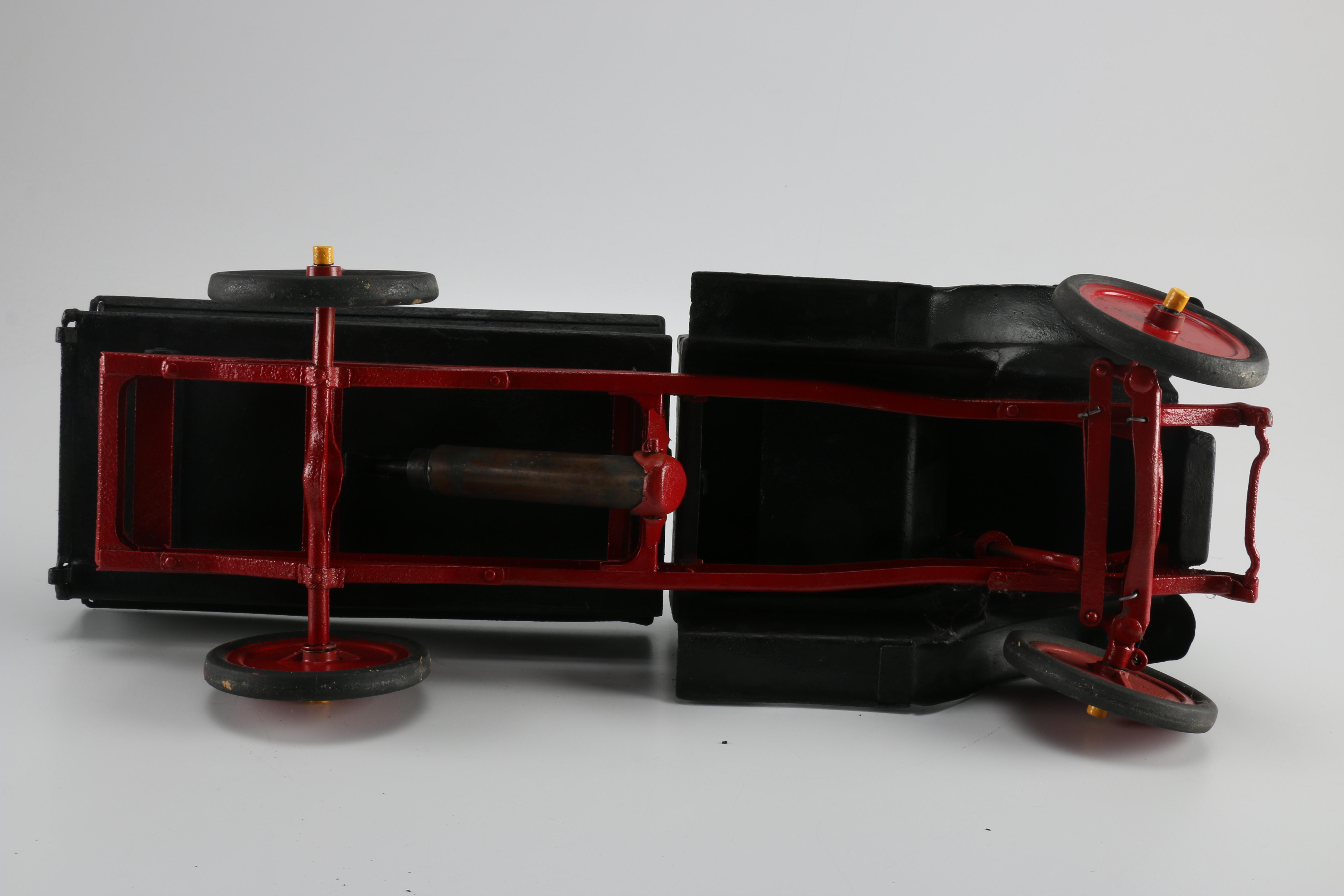 Black and Red Toy Truck
