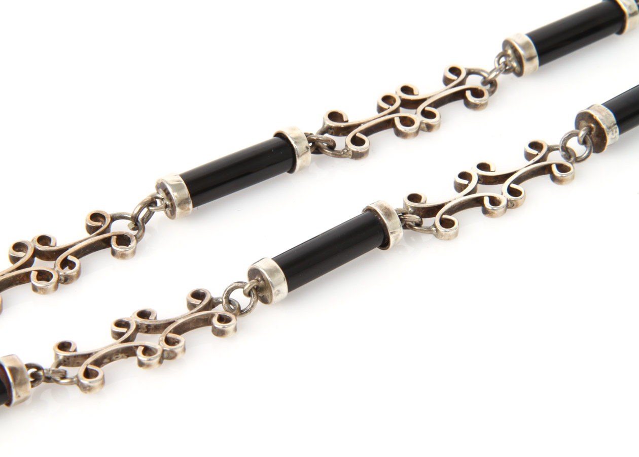 Taxco Sterling Silver, Onyx, and Inlaid Turquoise Aztec Warrior Face Necklace