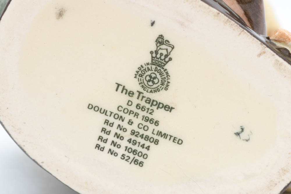 Two Vintage Royal Doulton Toby Character Mugs "The Trapper" and " Bootmaker"