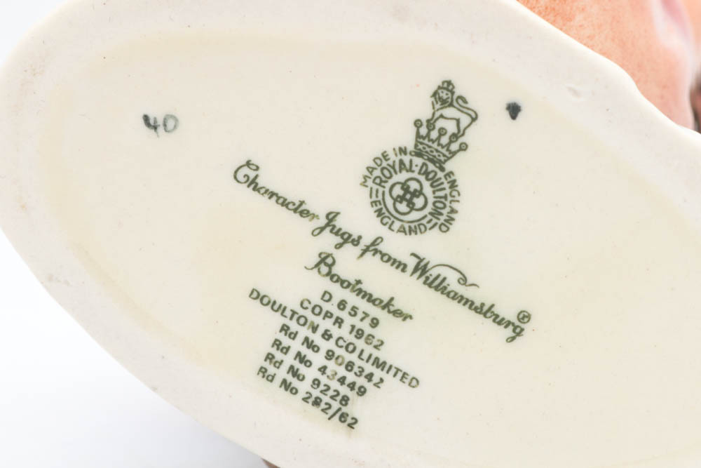 Two Vintage Royal Doulton Toby Character Mugs "The Trapper" and " Bootmaker"