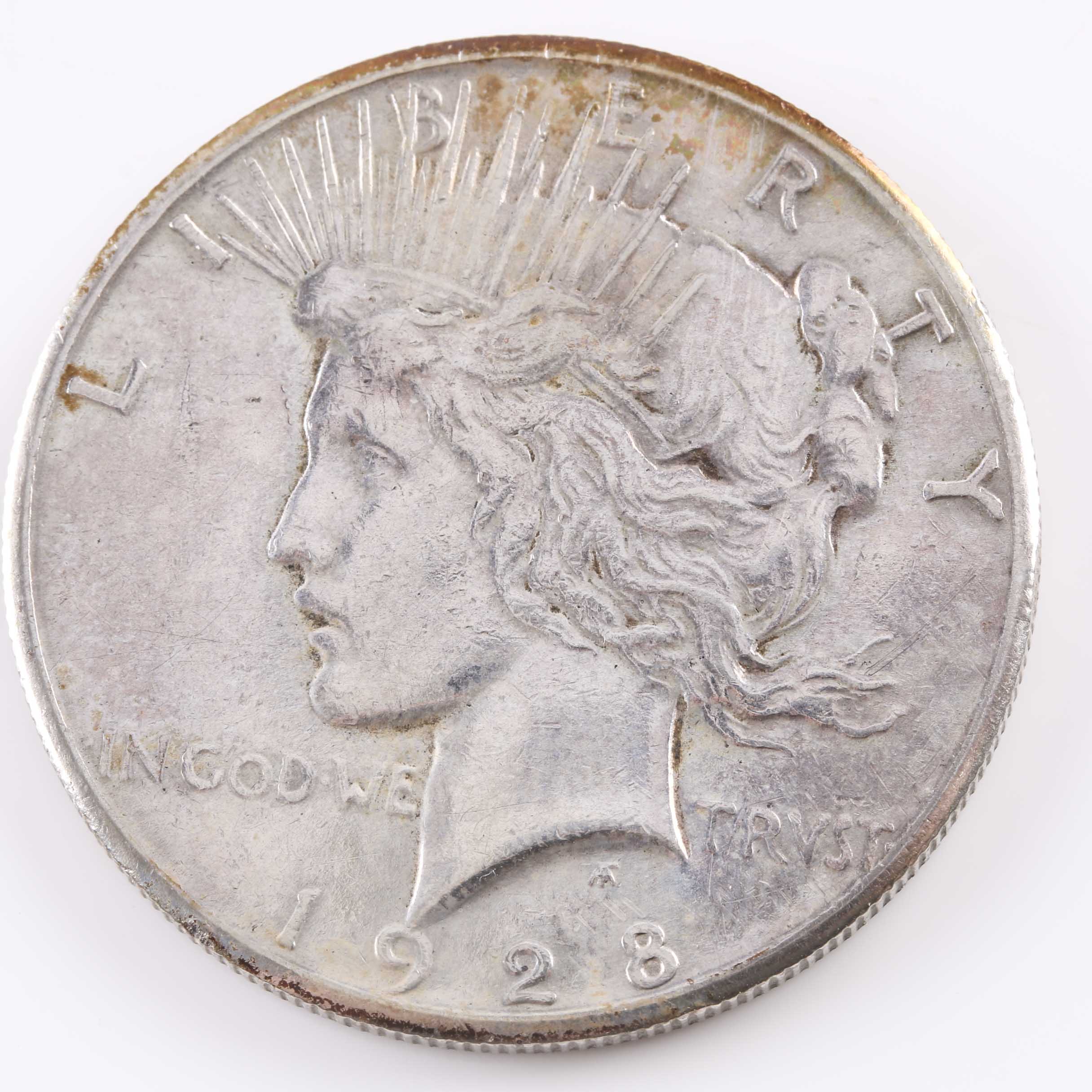 Complete Collection of Twenty-four Silver Peace Dollars in a Whitman Coin Folder