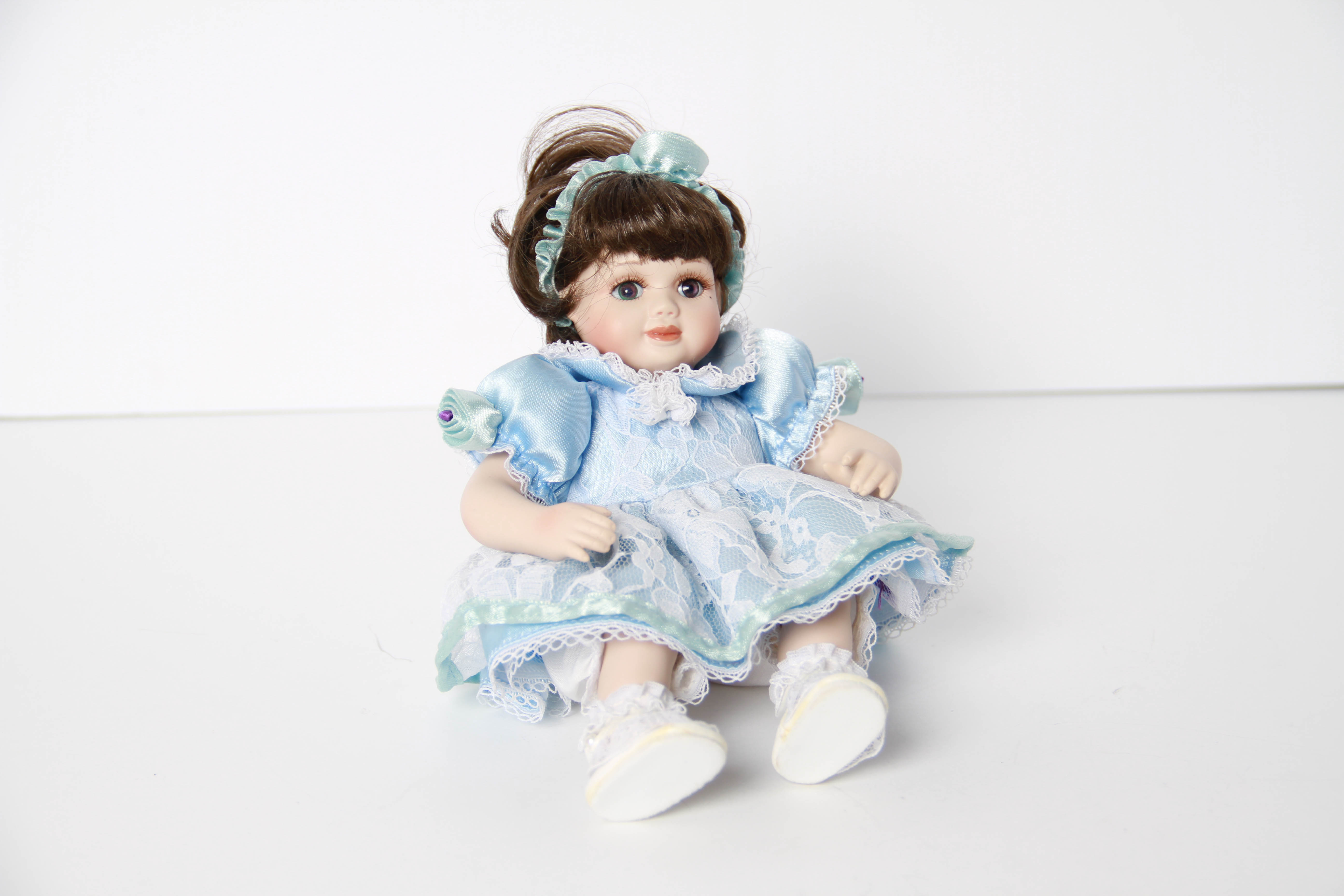 Porcelain Dolls Featuring Sleepy Eyes and Limited Edition