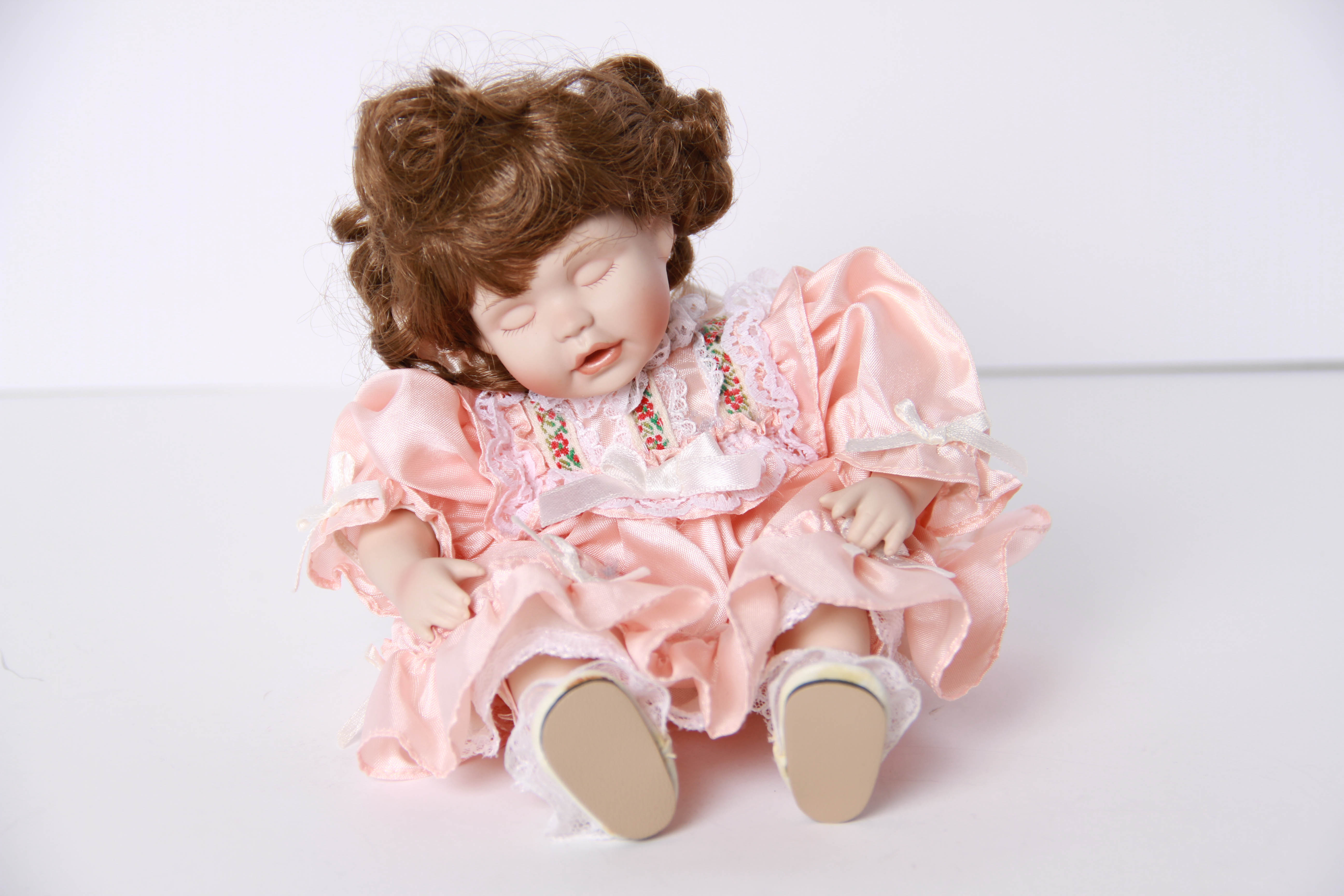 Porcelain Dolls Featuring Sleepy Eyes and Limited Edition