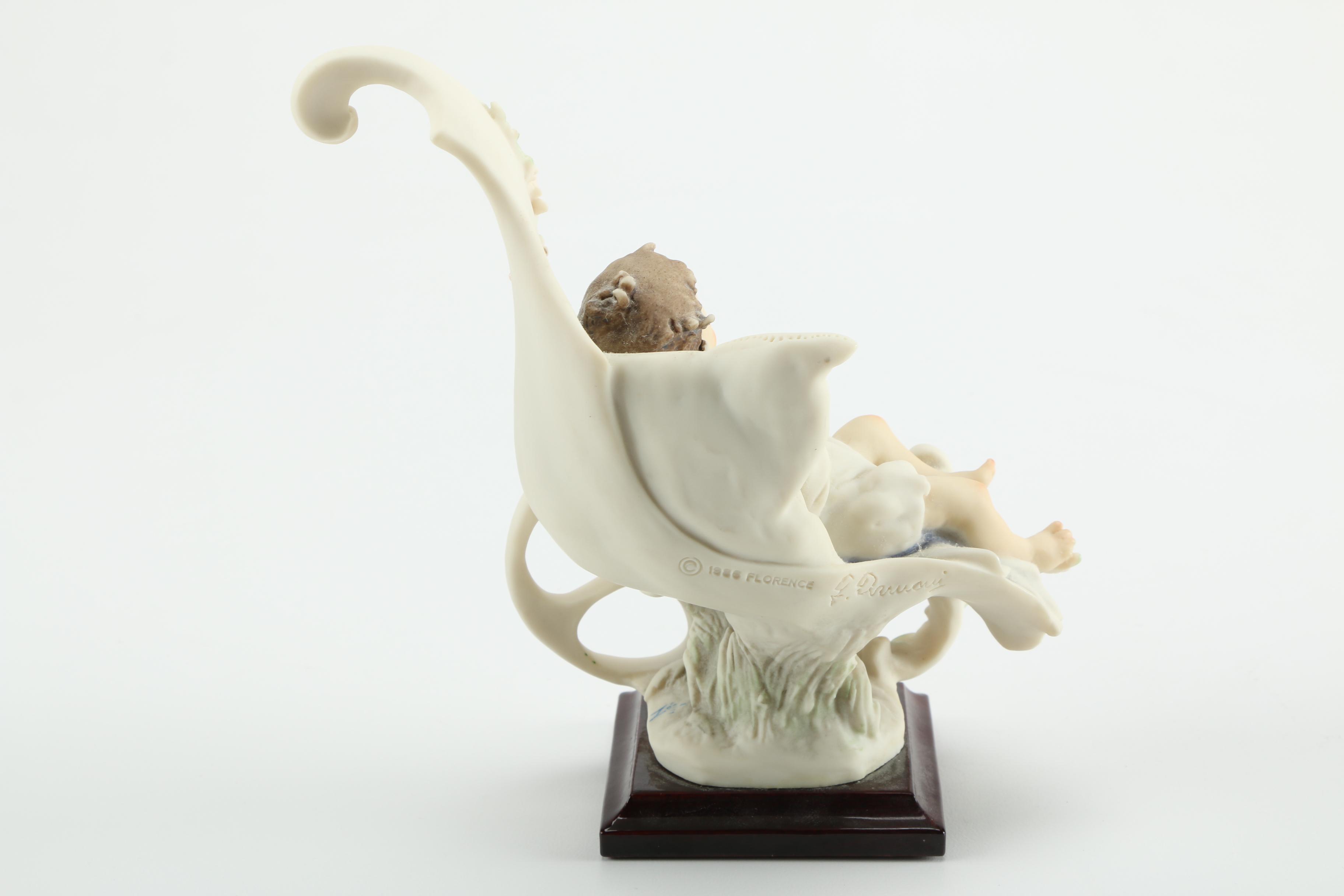 Giuseppe Armani Porcelain Figurines of Baby in Stroller and Girl Washing Clothing