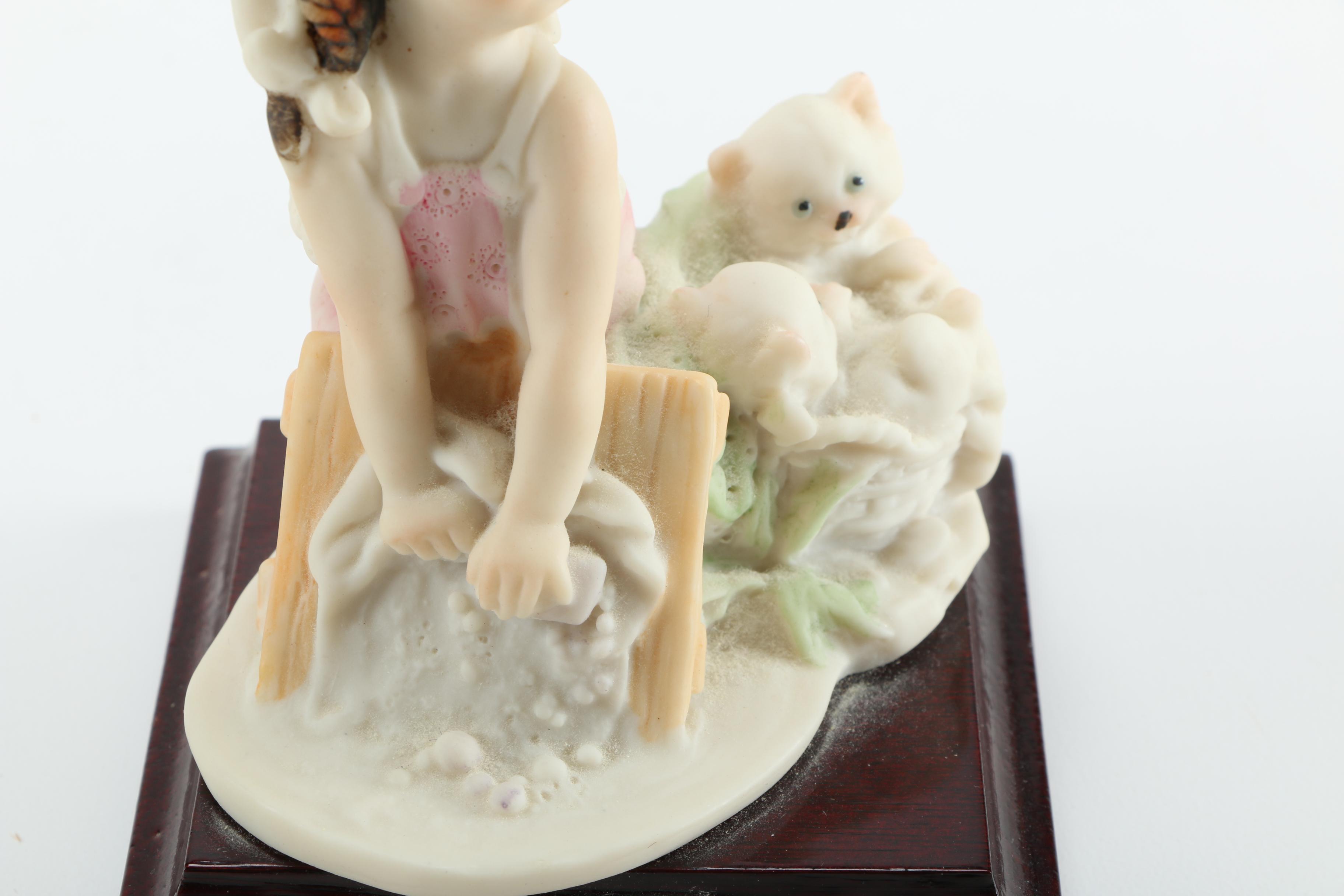 Giuseppe Armani Porcelain Figurines of Baby in Stroller and Girl Washing Clothing