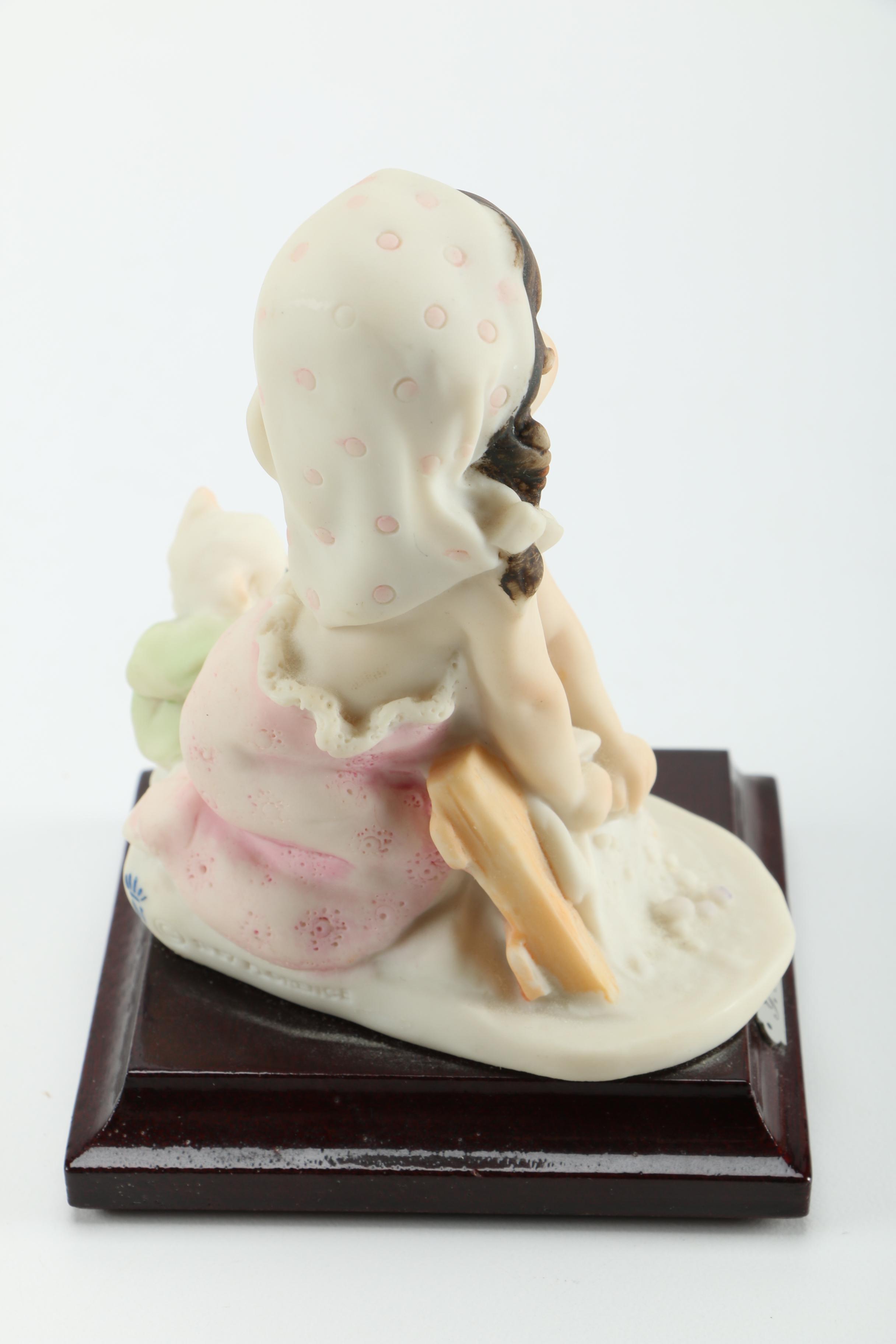 Giuseppe Armani Porcelain Figurines of Baby in Stroller and Girl Washing Clothing
