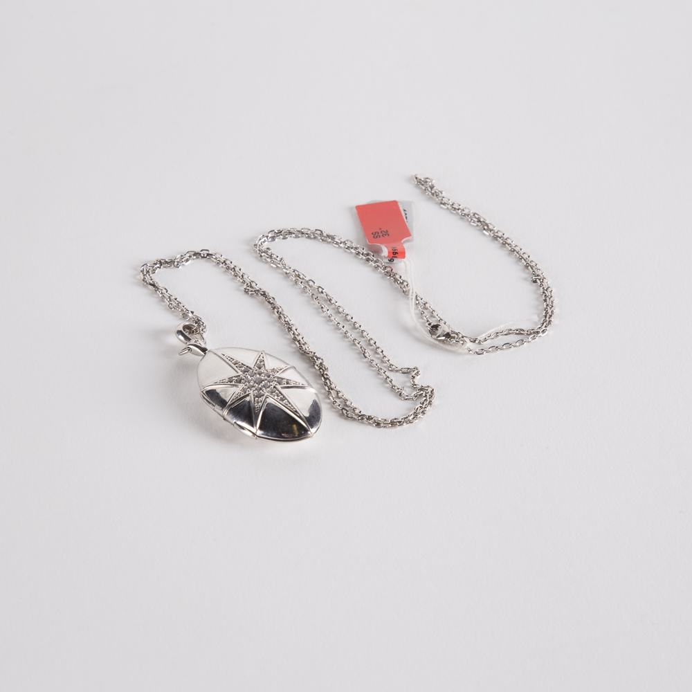 Sterling Silver And Cubic Zirconia Starburst Locket on a Sterling Chain