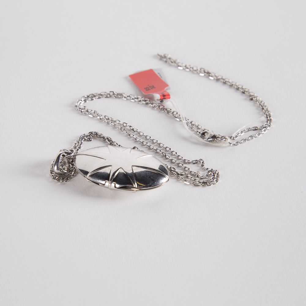 Sterling Silver And Cubic Zirconia Starburst Locket on a Sterling Chain