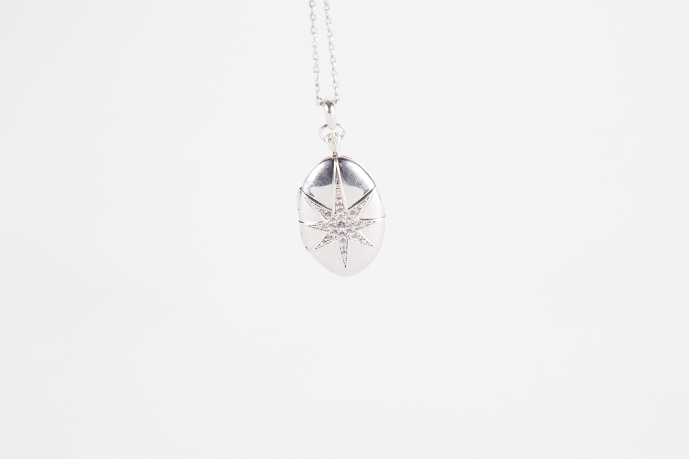Sterling Silver And Cubic Zirconia Starburst Locket on a Sterling Chain