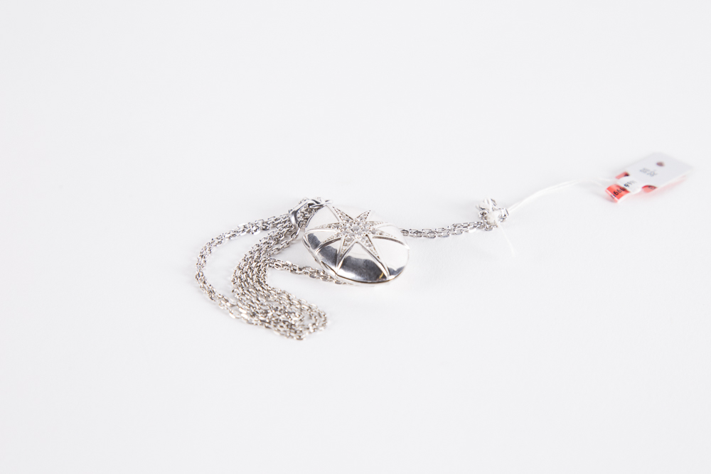 Sterling Silver And Cubic Zirconia Starburst Locket on a Sterling Chain