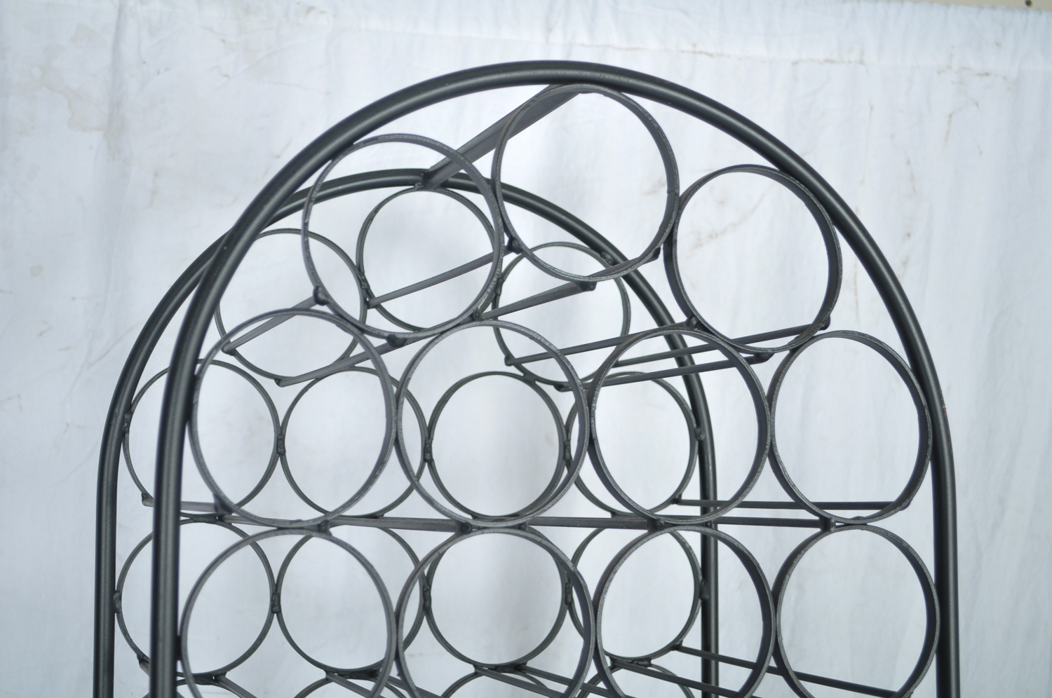 Sixty-Seven Bottle Iron Wine Rack