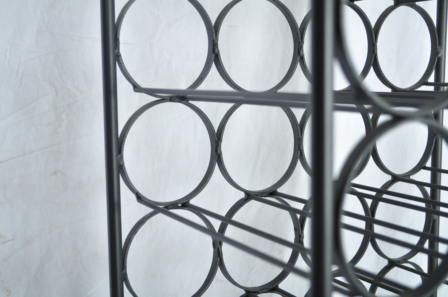 Sixty-Seven Bottle Iron Wine Rack