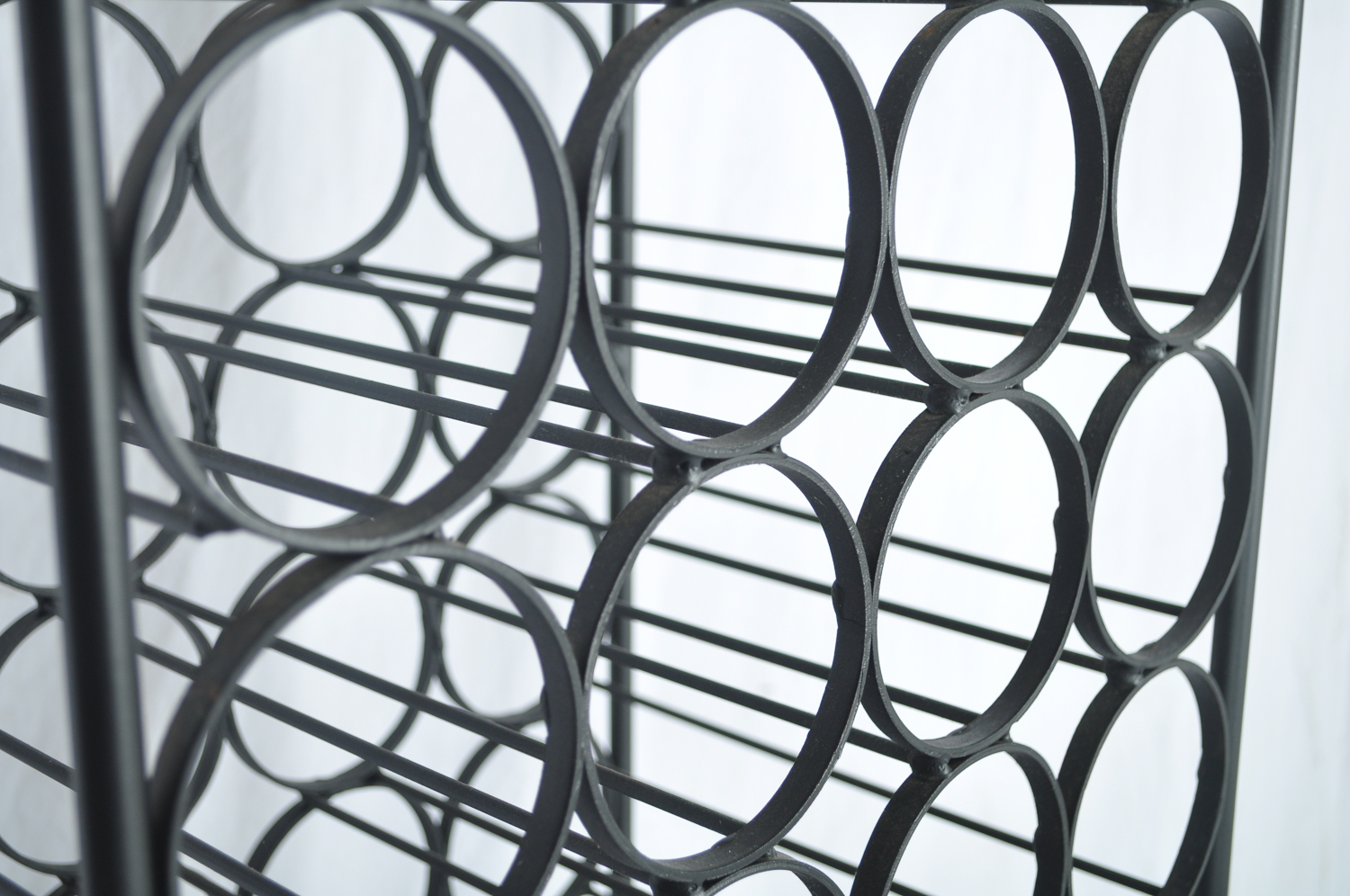 Sixty-Seven Bottle Iron Wine Rack