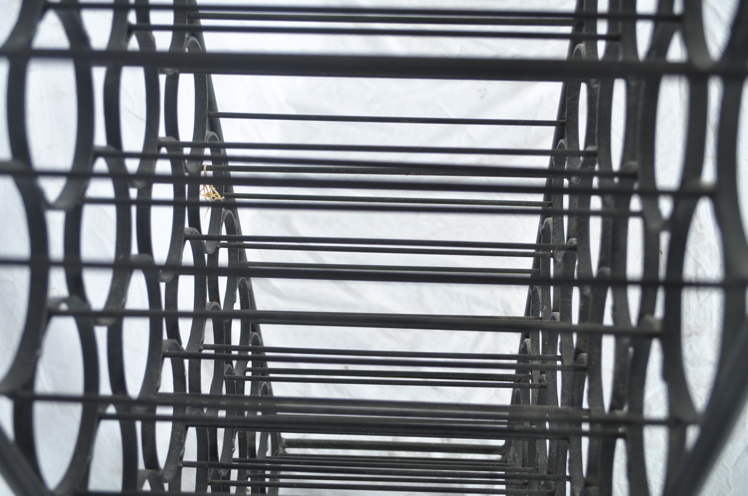 Sixty-Seven Bottle Iron Wine Rack