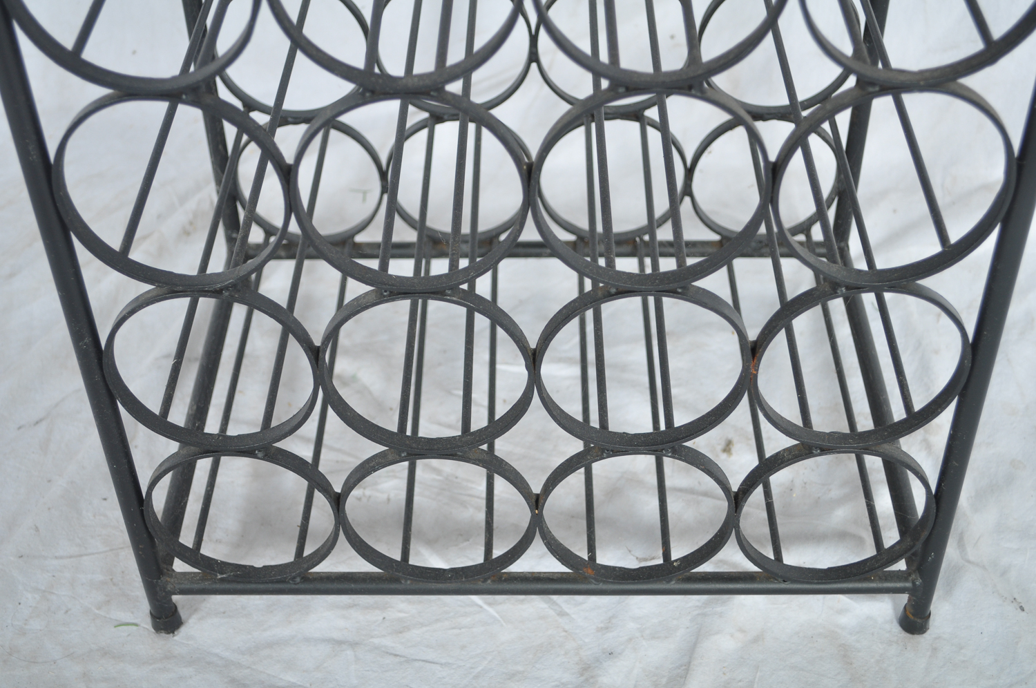 Sixty-Seven Bottle Iron Wine Rack