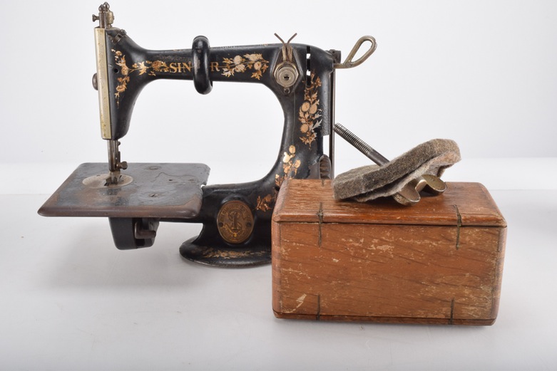 Antique Iron Mobile Singer Sewing Machine and Box of Attachments