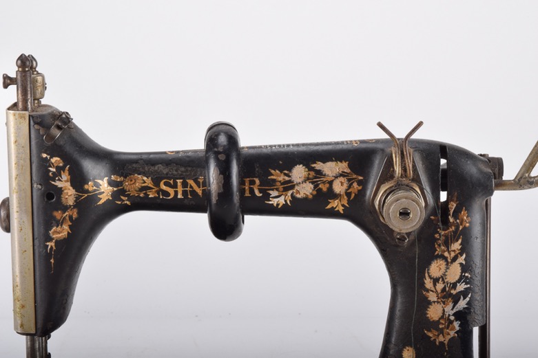 Antique Iron Mobile Singer Sewing Machine and Box of Attachments