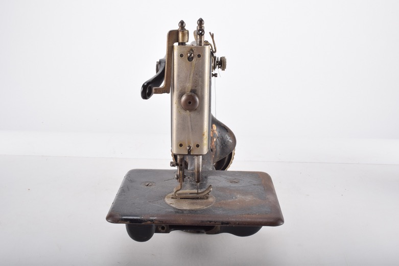 Antique Iron Mobile Singer Sewing Machine and Box of Attachments