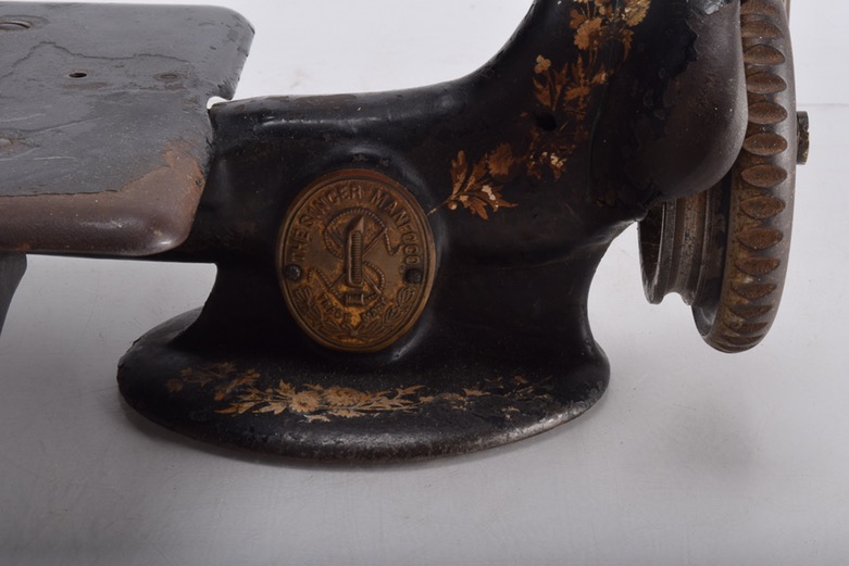 Antique Iron Mobile Singer Sewing Machine and Box of Attachments