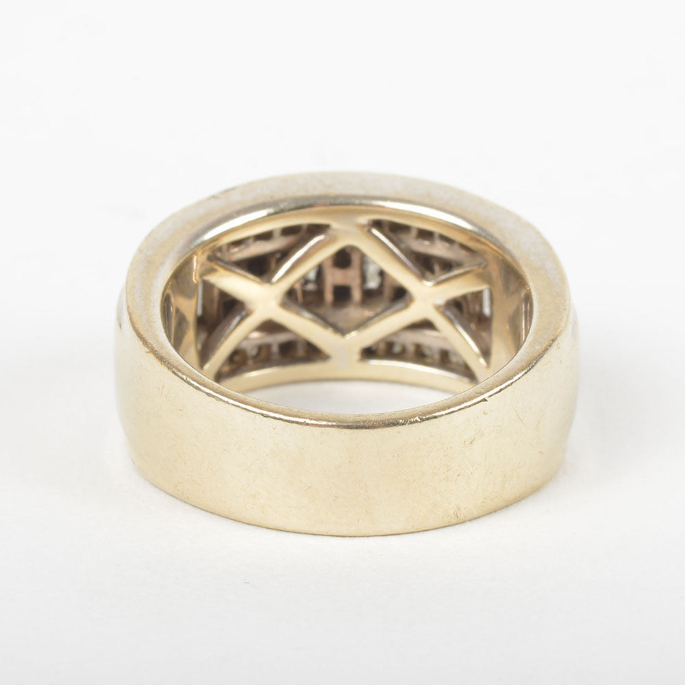 18K White and Yellow Gold Ring with Channel Set Baguette and Round Diamonds