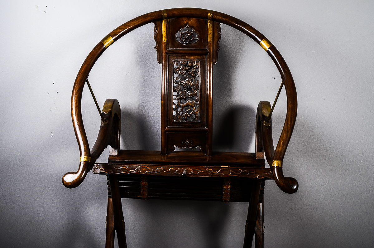 20th Century Chinese Carved Horseshoe-Back Folding Armchair
