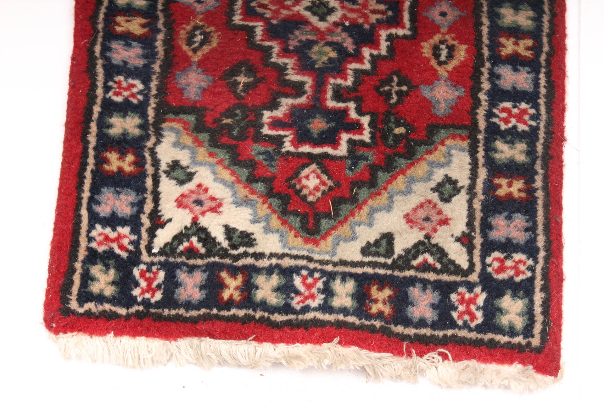 Matching Pair of Handwoven Persian Accent Rugs