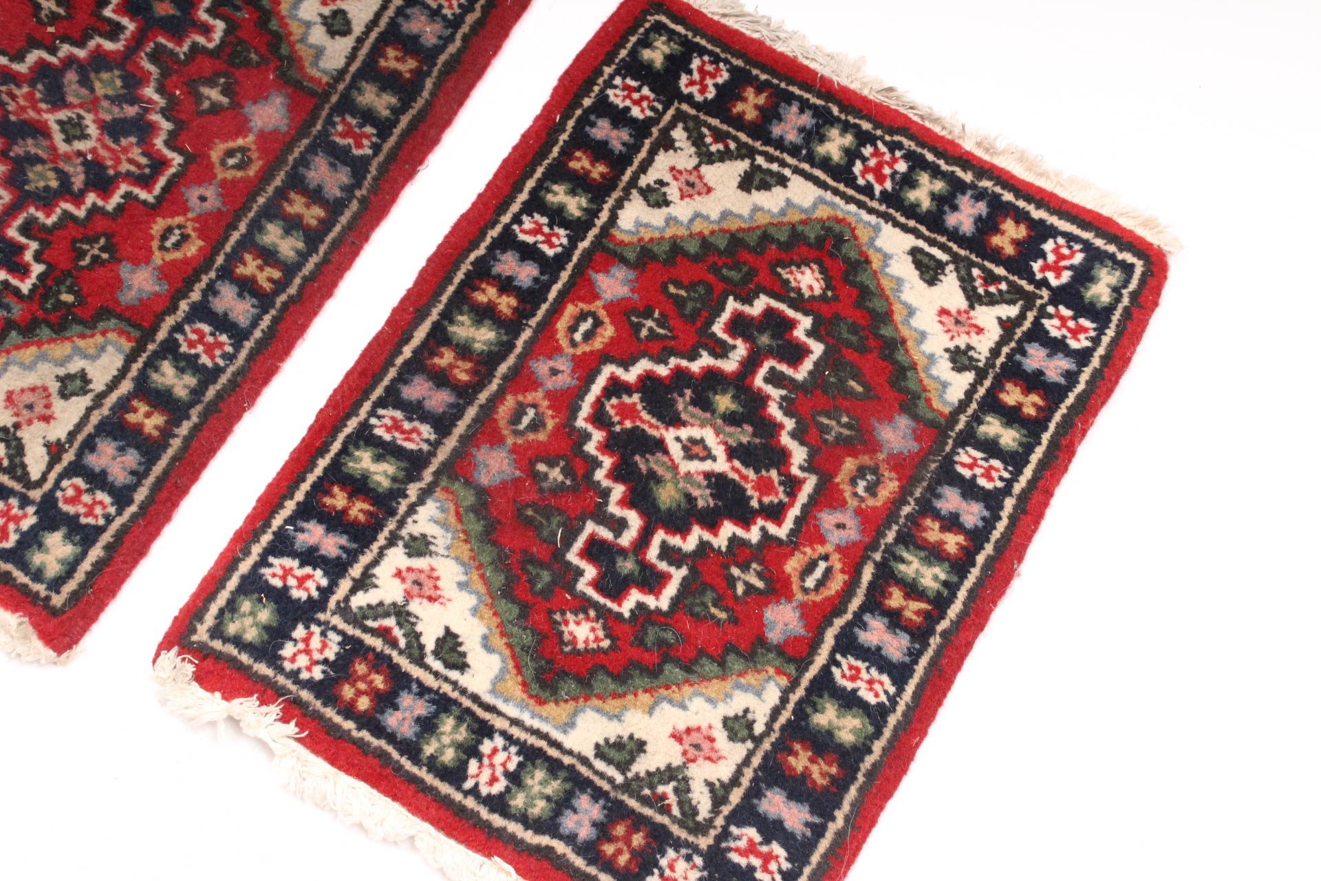 Matching Pair of Handwoven Persian Accent Rugs