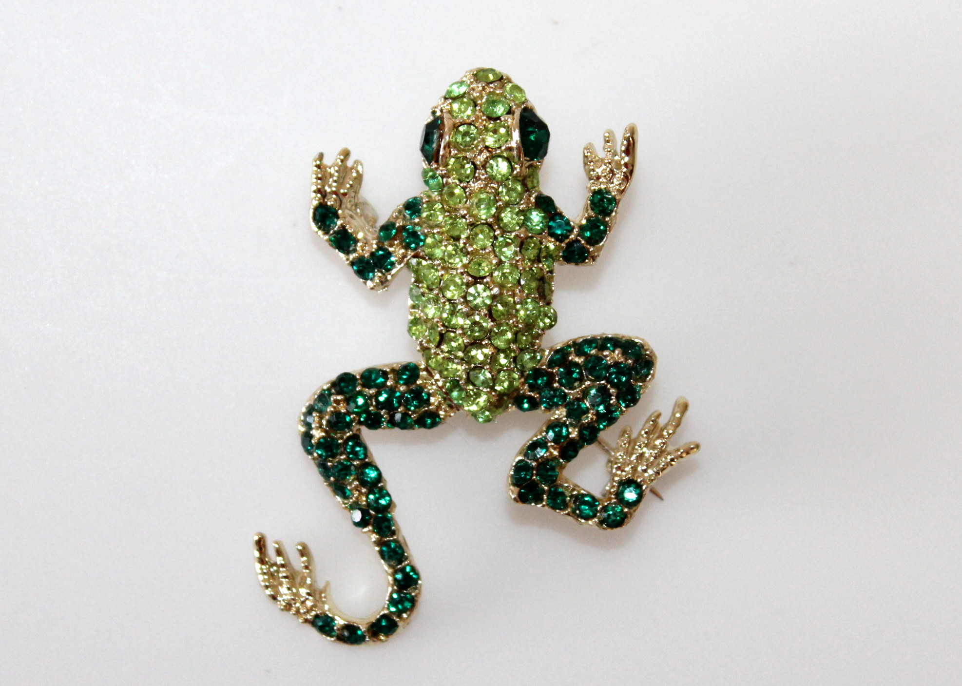 Figural Brooches Including Paretta