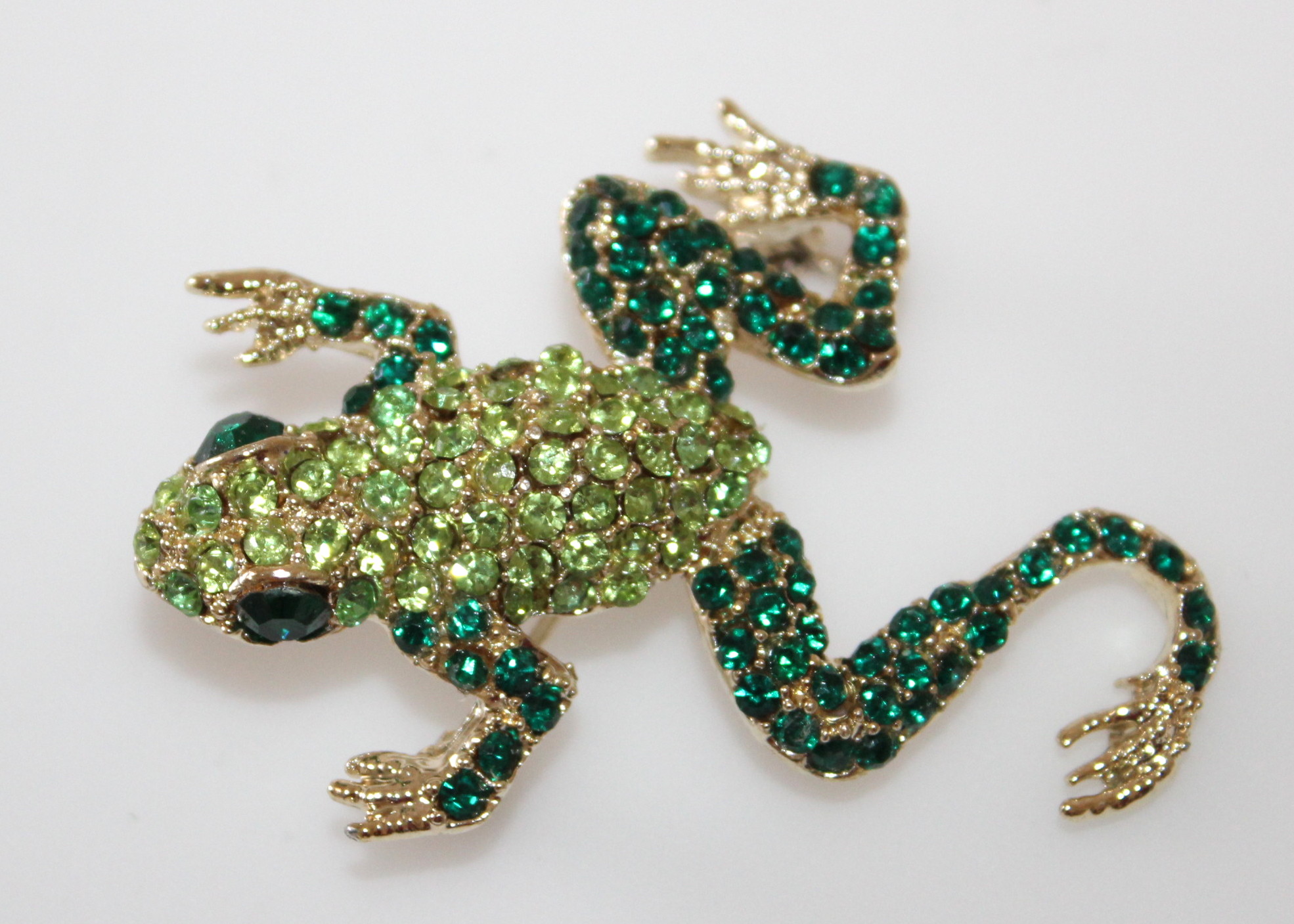 Figural Brooches Including Paretta